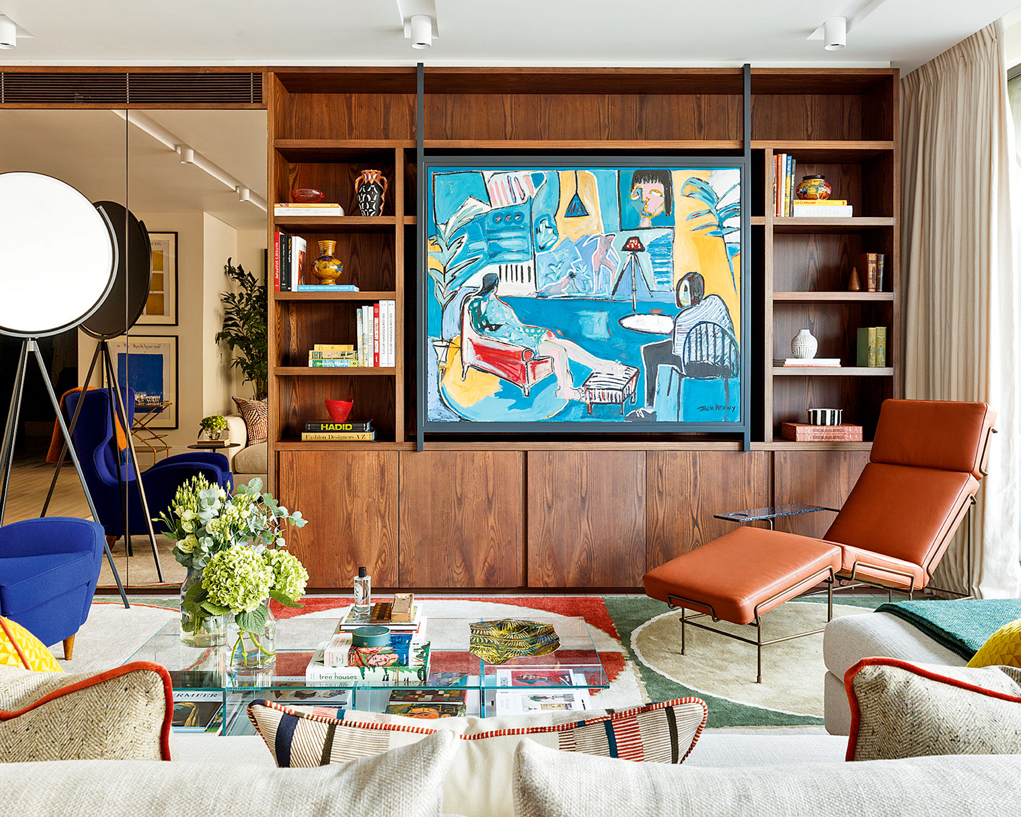 Family room with wooden joinery built around statement art
