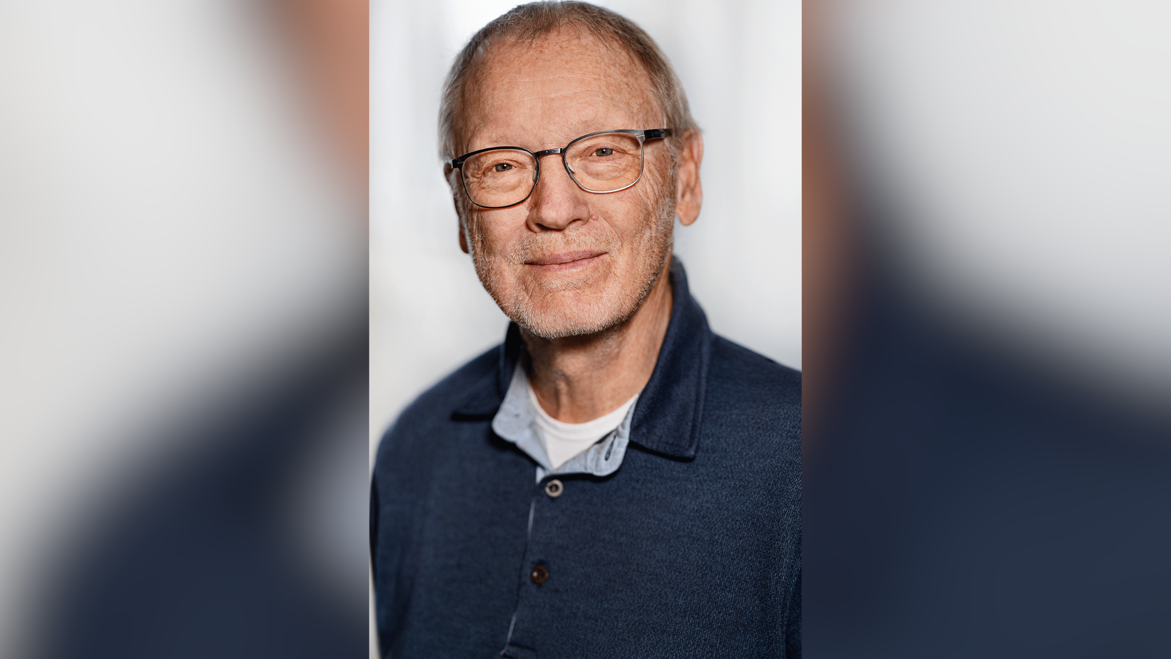 A headshot of Jens Holst in the centre against an enlarged, blurred version of the same photo.