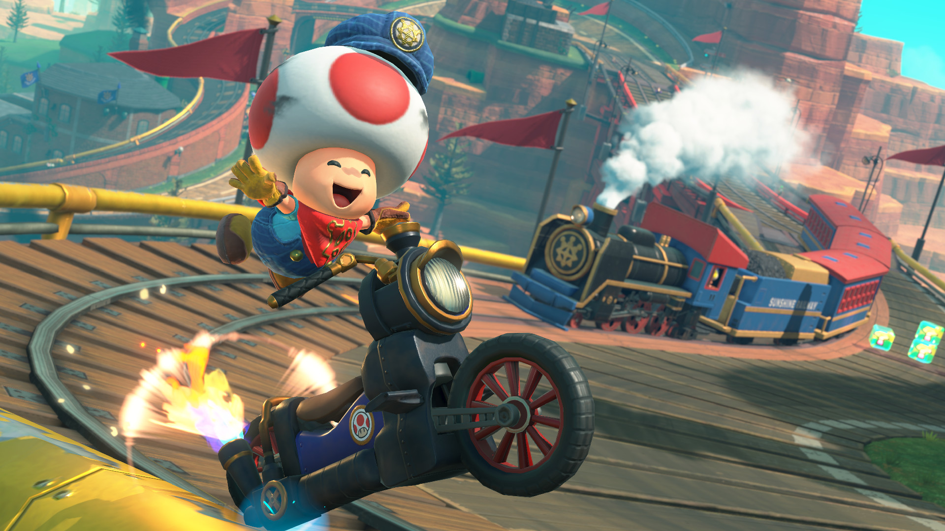 Mario Kart World screenshot showing Toad elated after hitting a boost pad on a bike