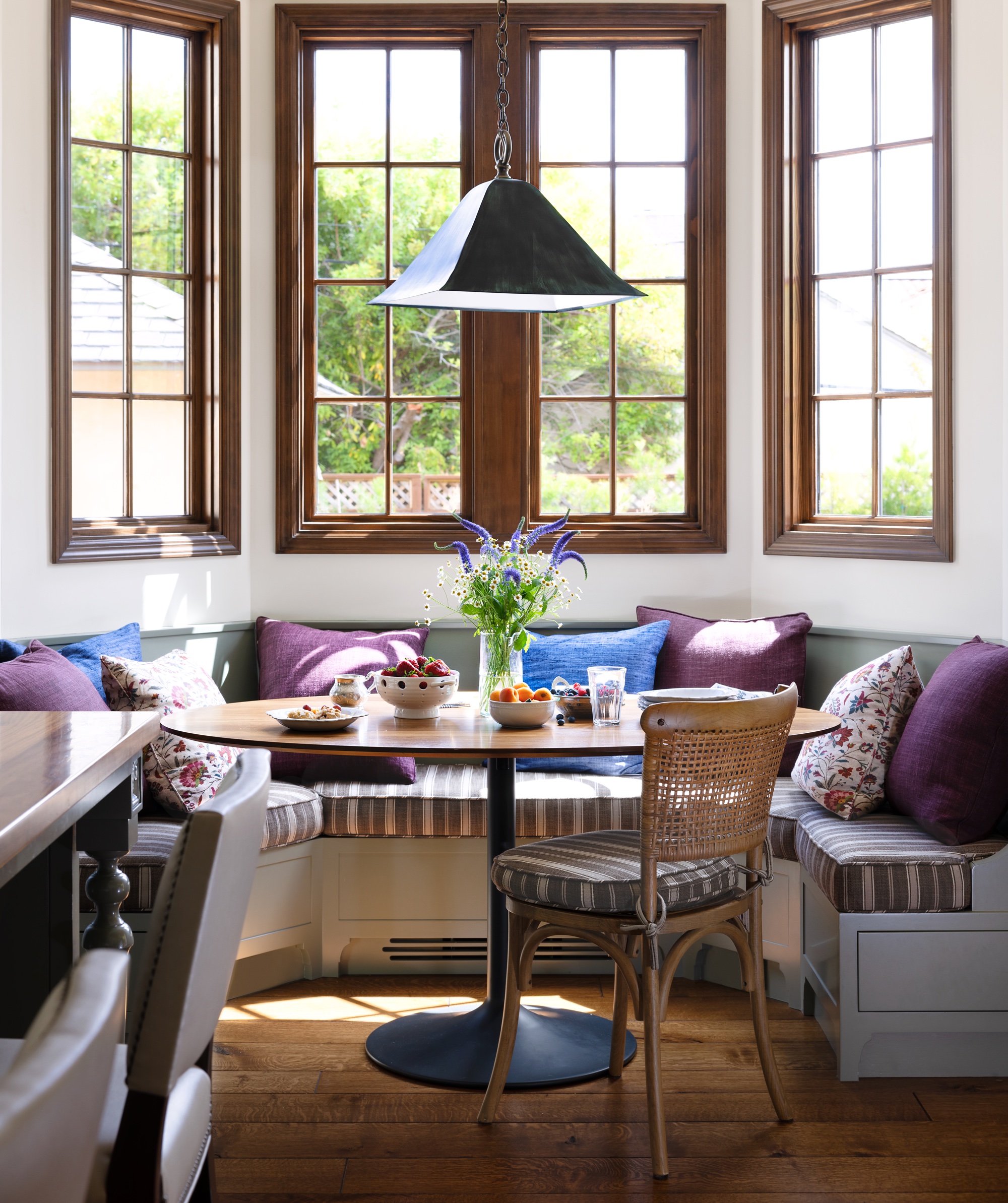 Dining nook with banquette seating in kitchen