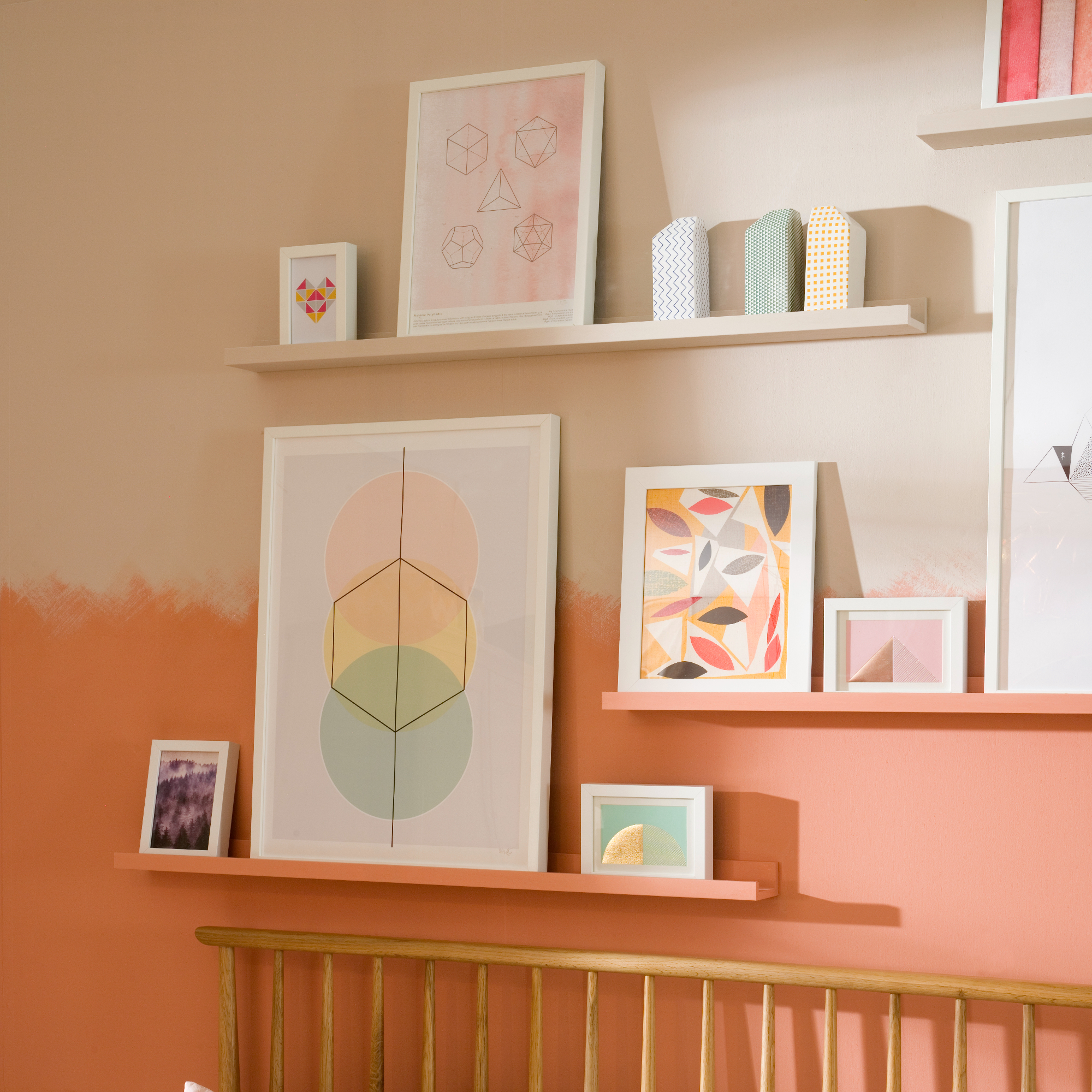 Orange bedroom wall with picture shelves