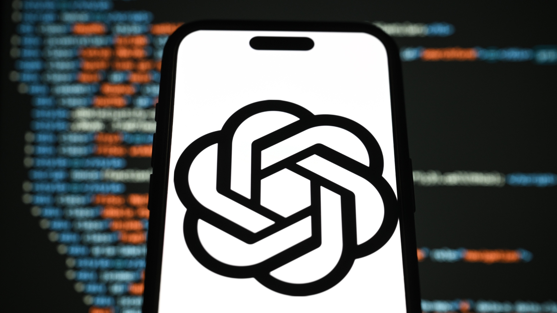 ChatGPT logo is displayed on mobile phone screen.