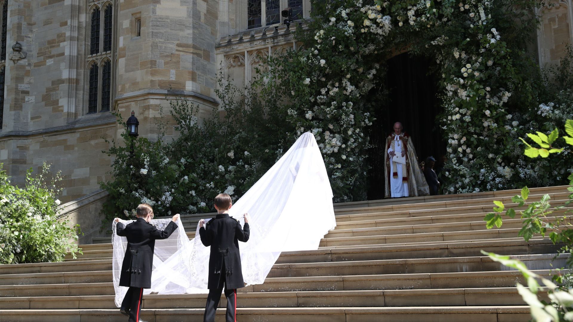 Meghan walking down the aisle.