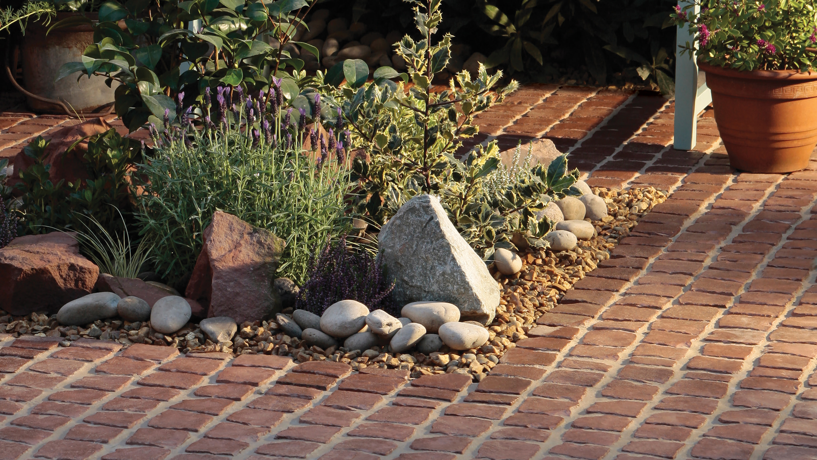 cobblestones with pebbles and planting scheme