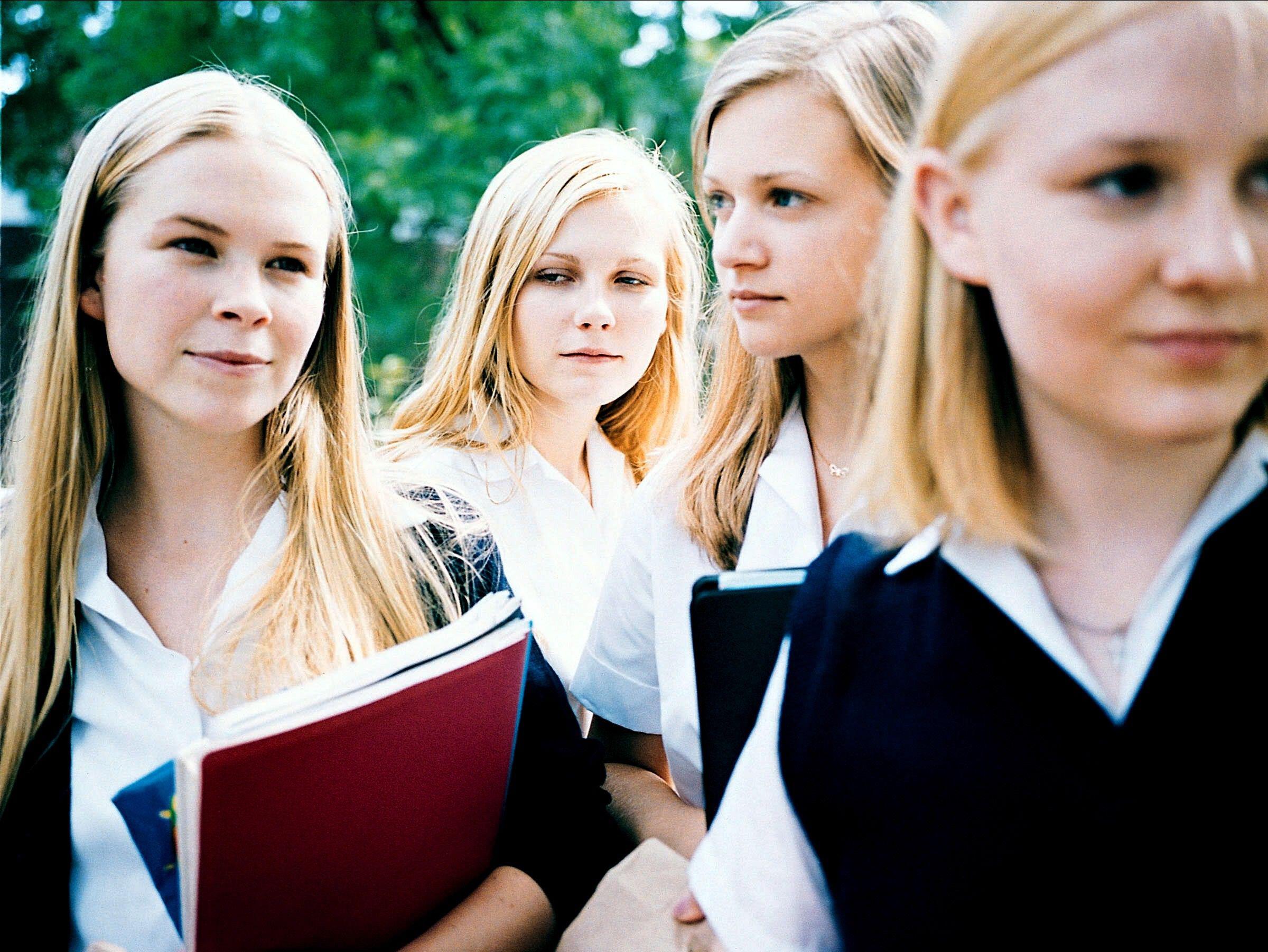 the lisbon sisters wearing school uniforms in a still from the virgin suicides