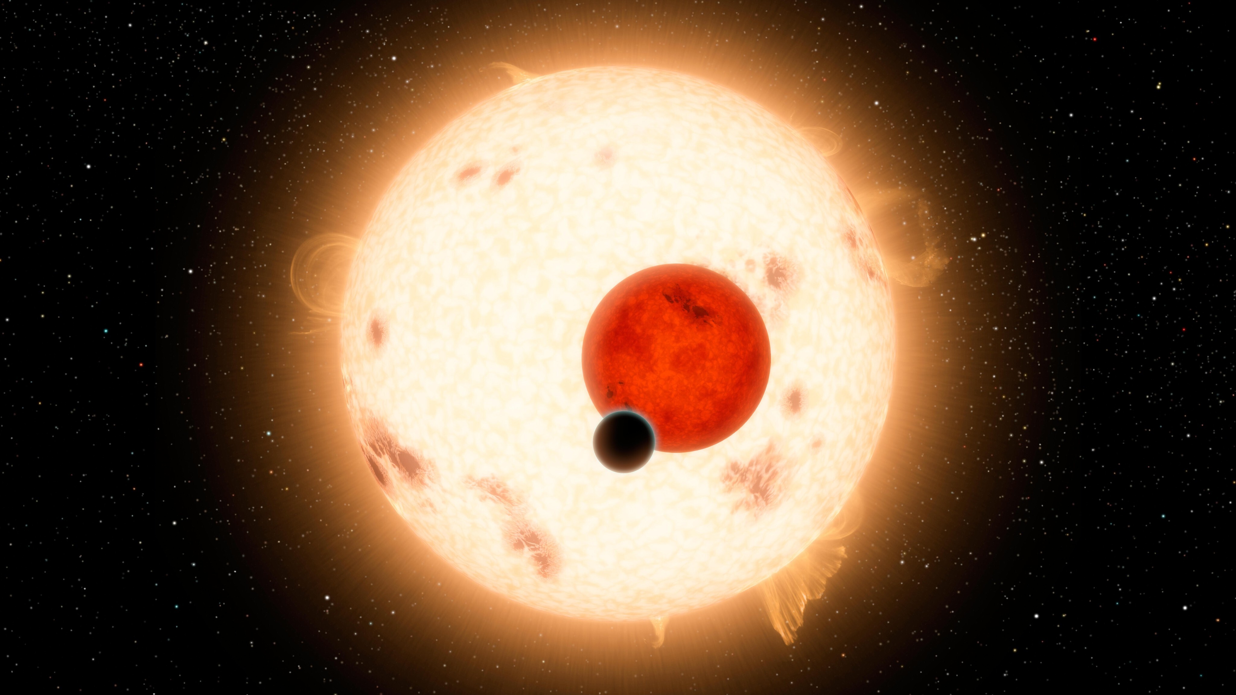 An artist's rendering of Kepler 16-b and its two suns