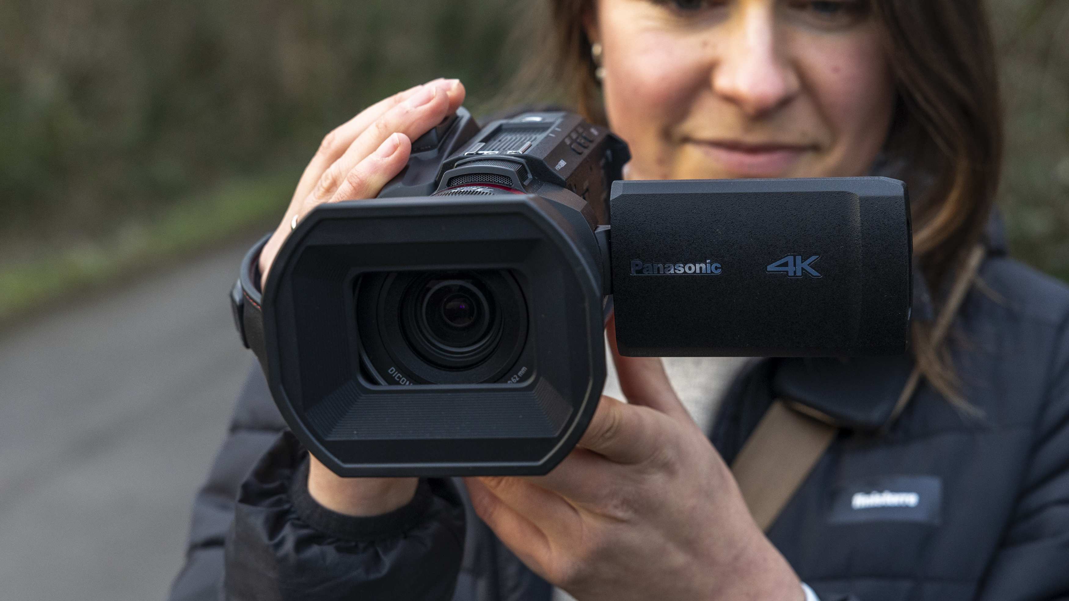 The Panasonic HC-X1500 camcorder in a female photographer&#039;s hands