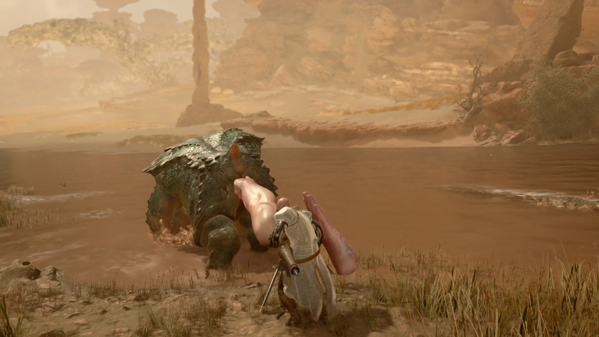 A monster hunter pokes a monster in its butt using the giant finger lance.