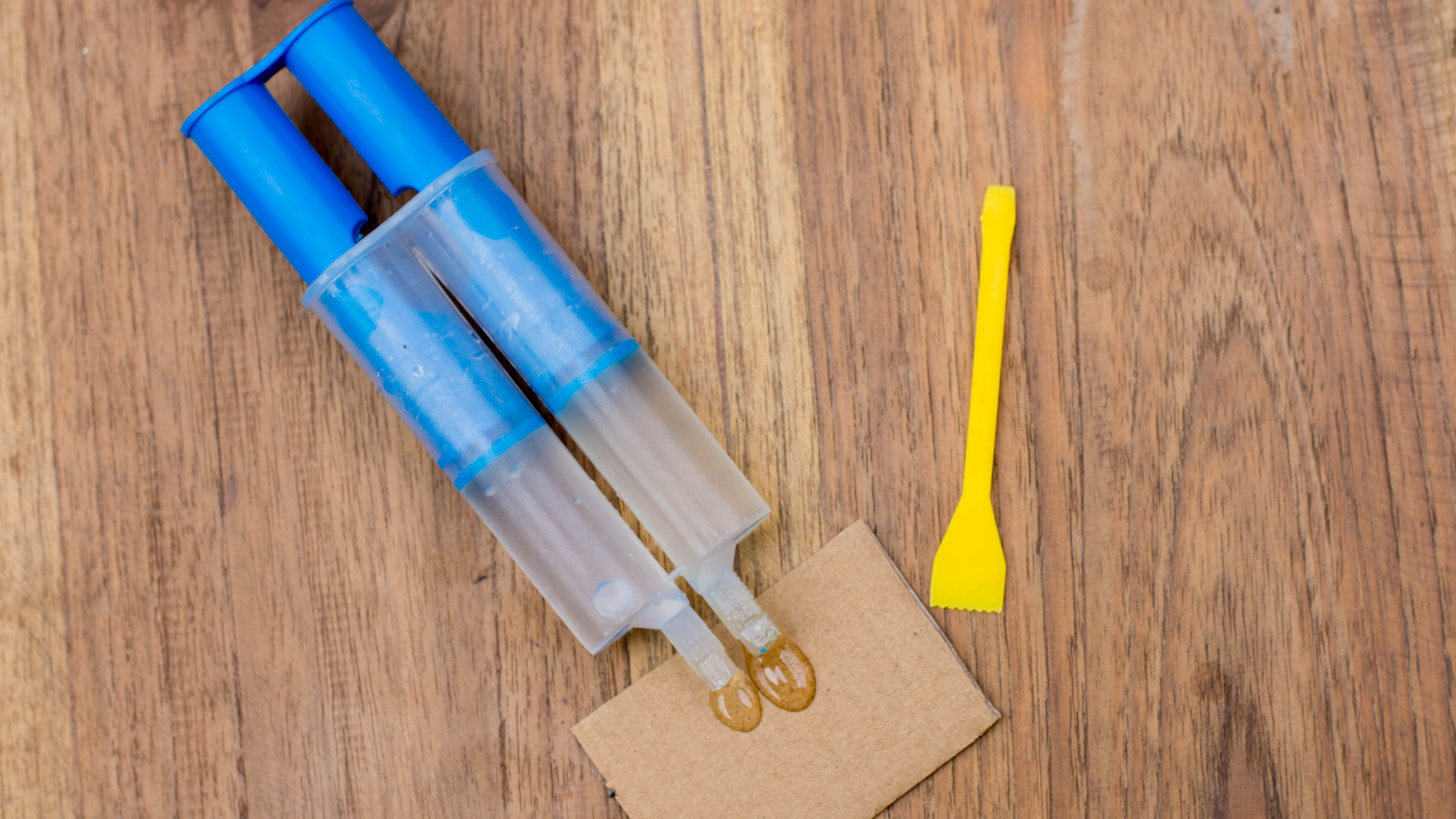 Glue tubes on cardboard