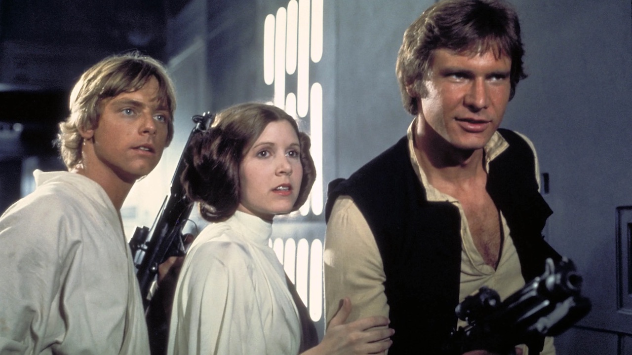 Mark Hamill, Carrie Fisher and Harrison Ford in 1977&#039;s Star Wars: A New Hope