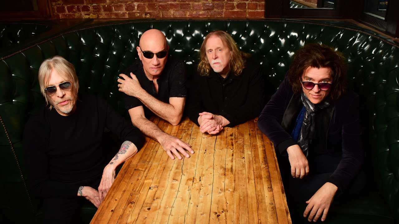 Gov't Mule sitting at a table