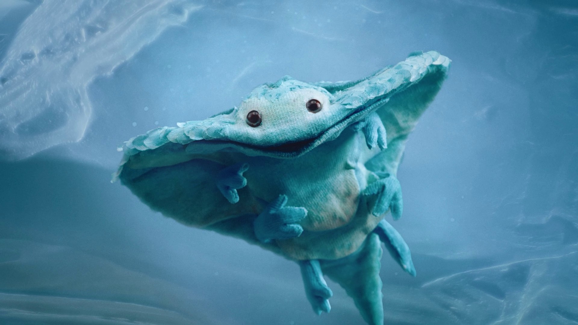The cute, blue manta-like creature from Out of Words, Aleph. 