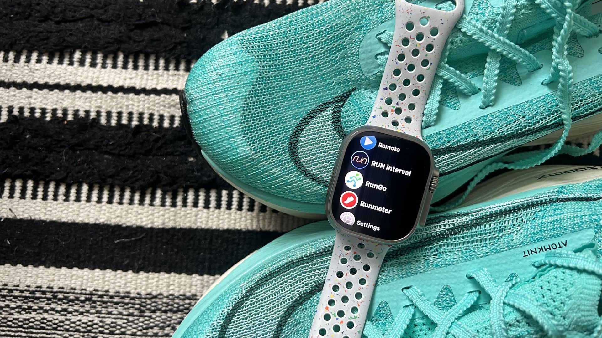 Apple Watch running apps on top of nike sneakers