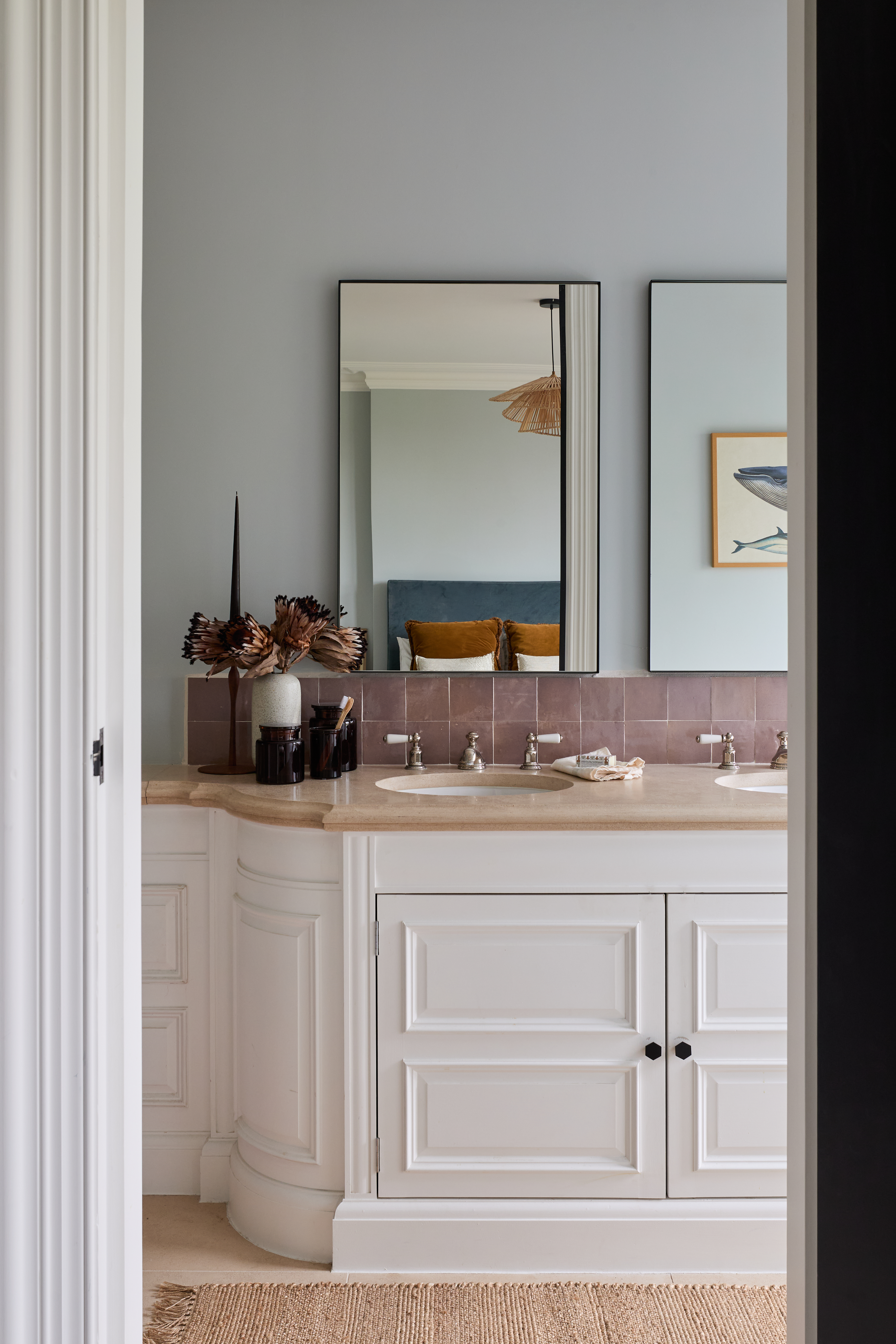 Light blue bathroom with lilac tiles by Imperfect Interiors