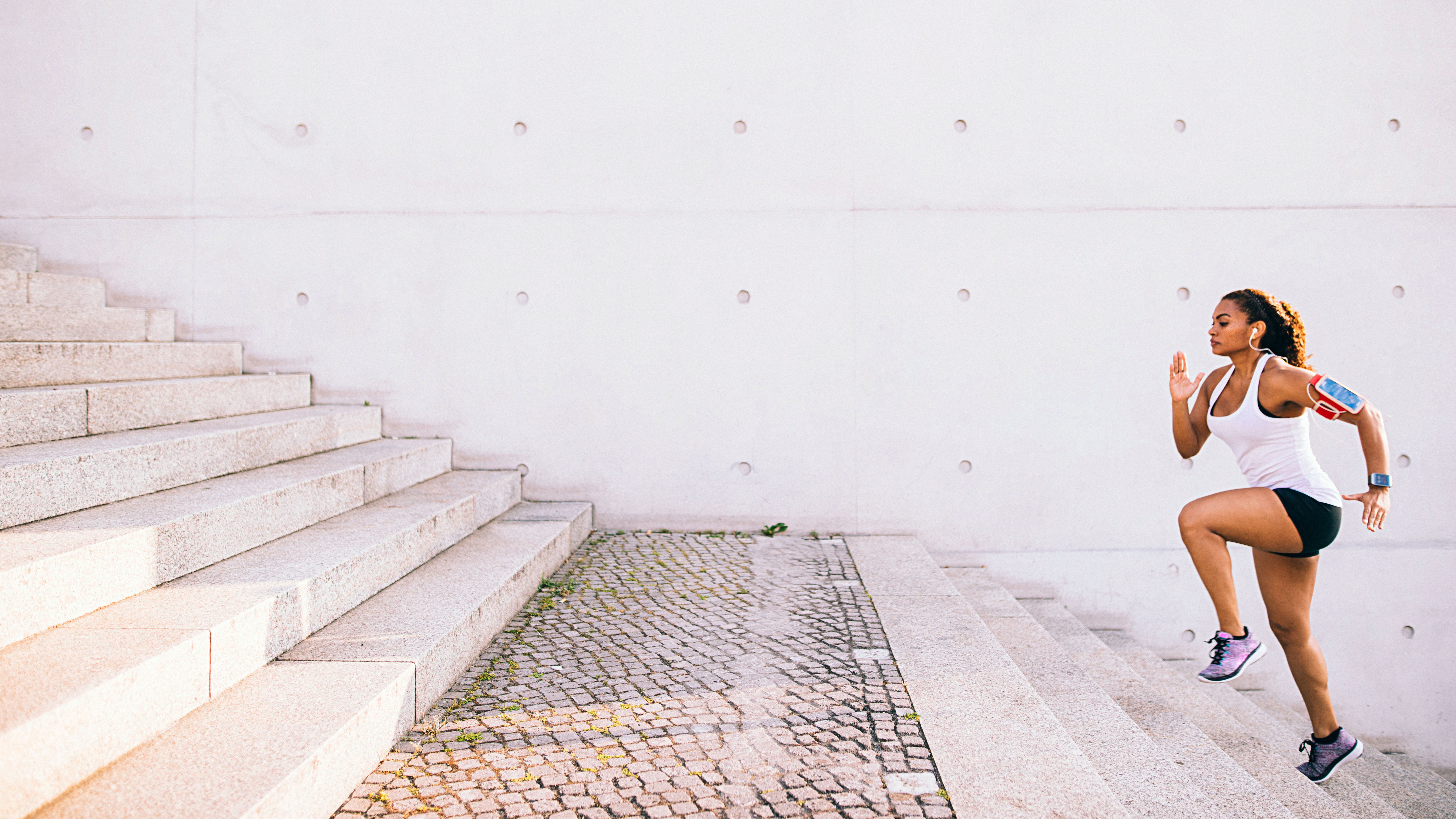 Woman working out on stairs