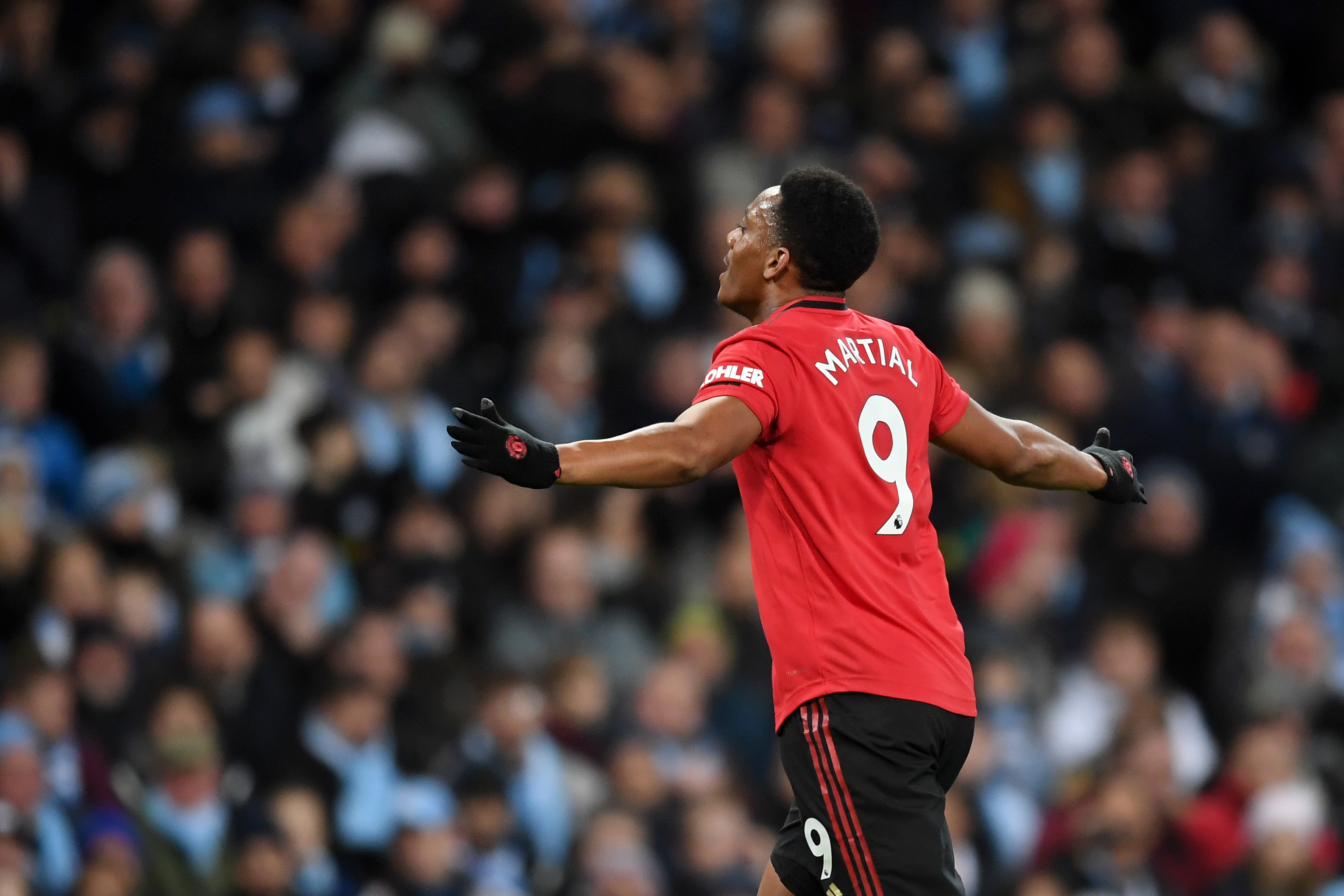 Anthony Martial celebrates after scoring for Manchester United against Manchester City in the Premier League in December 2019.