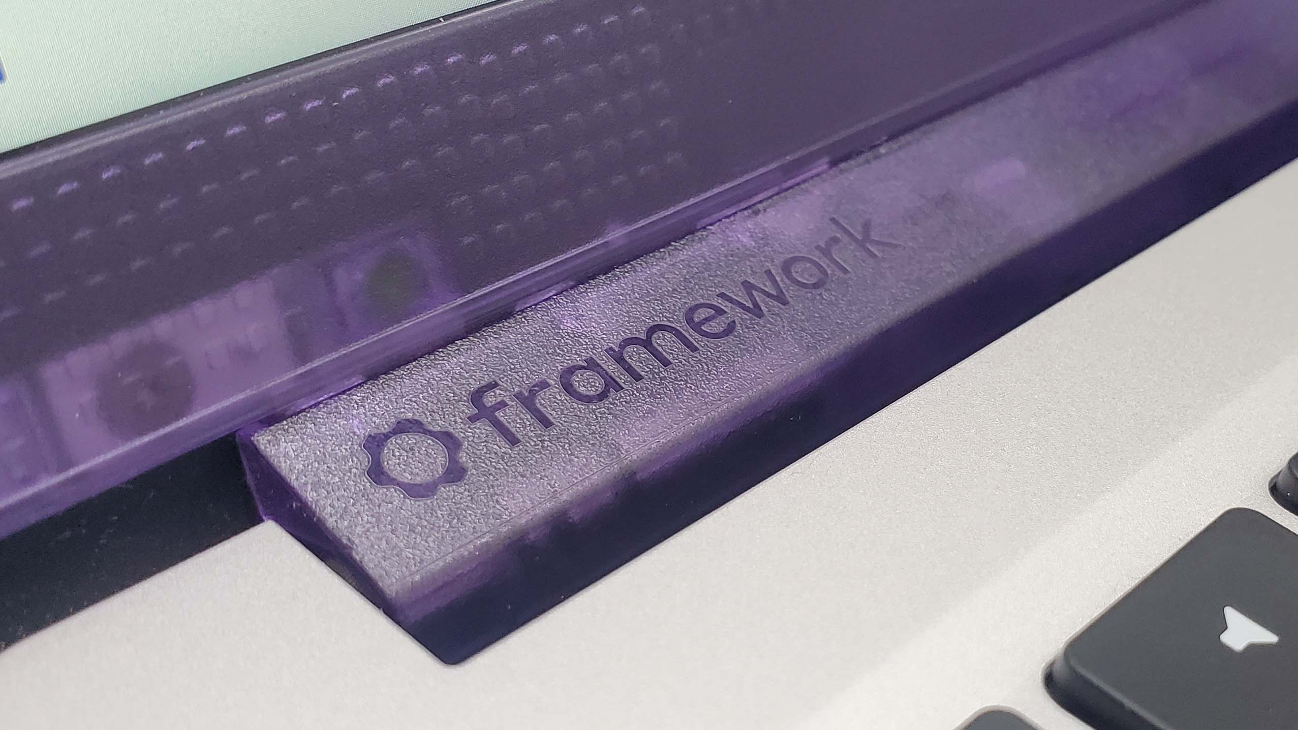 Framework 13 laptop on a dark grey background