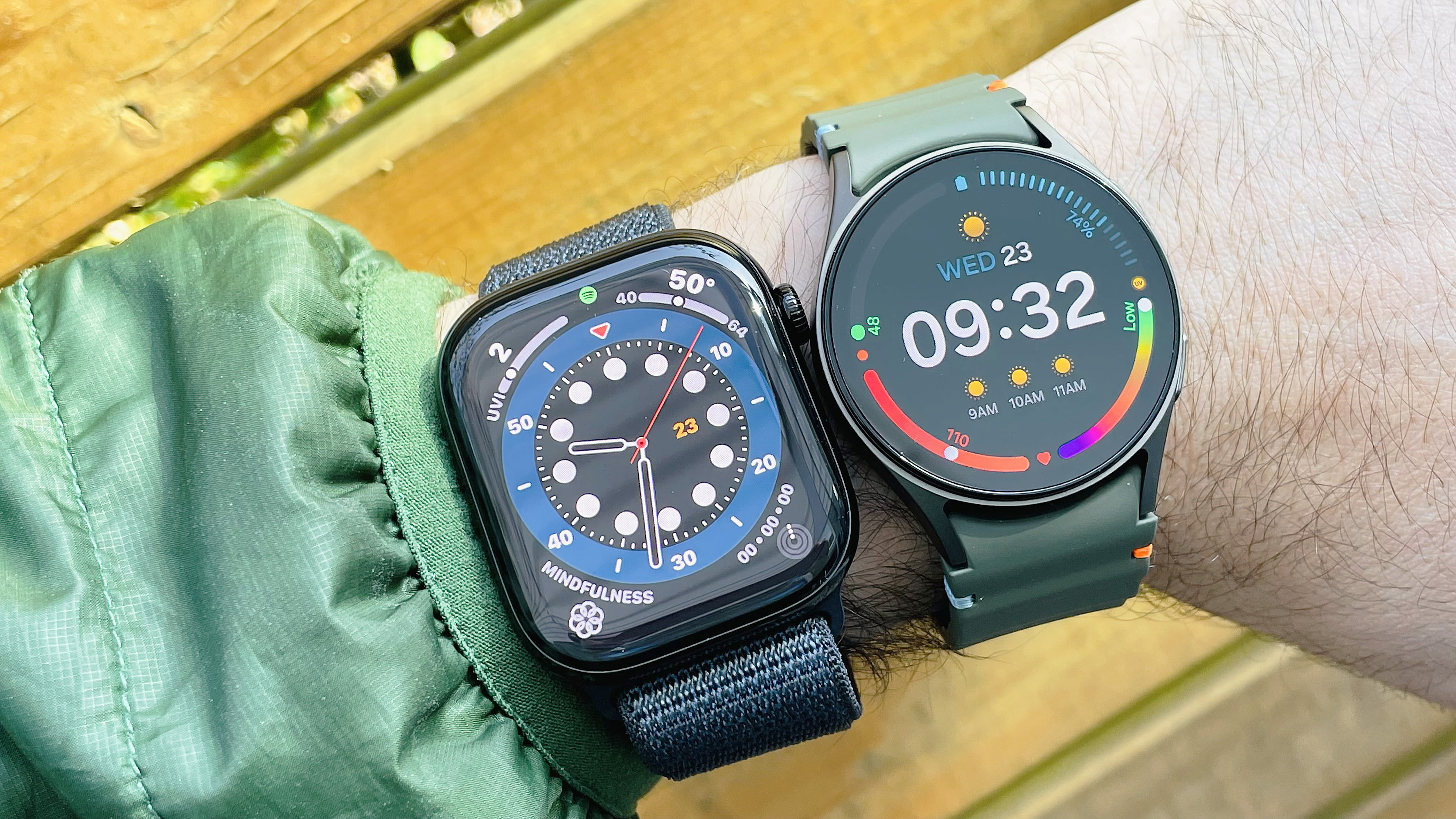 Close-up of the Apple Watch Series 10 next to the Samsung Galaxy Watch 7