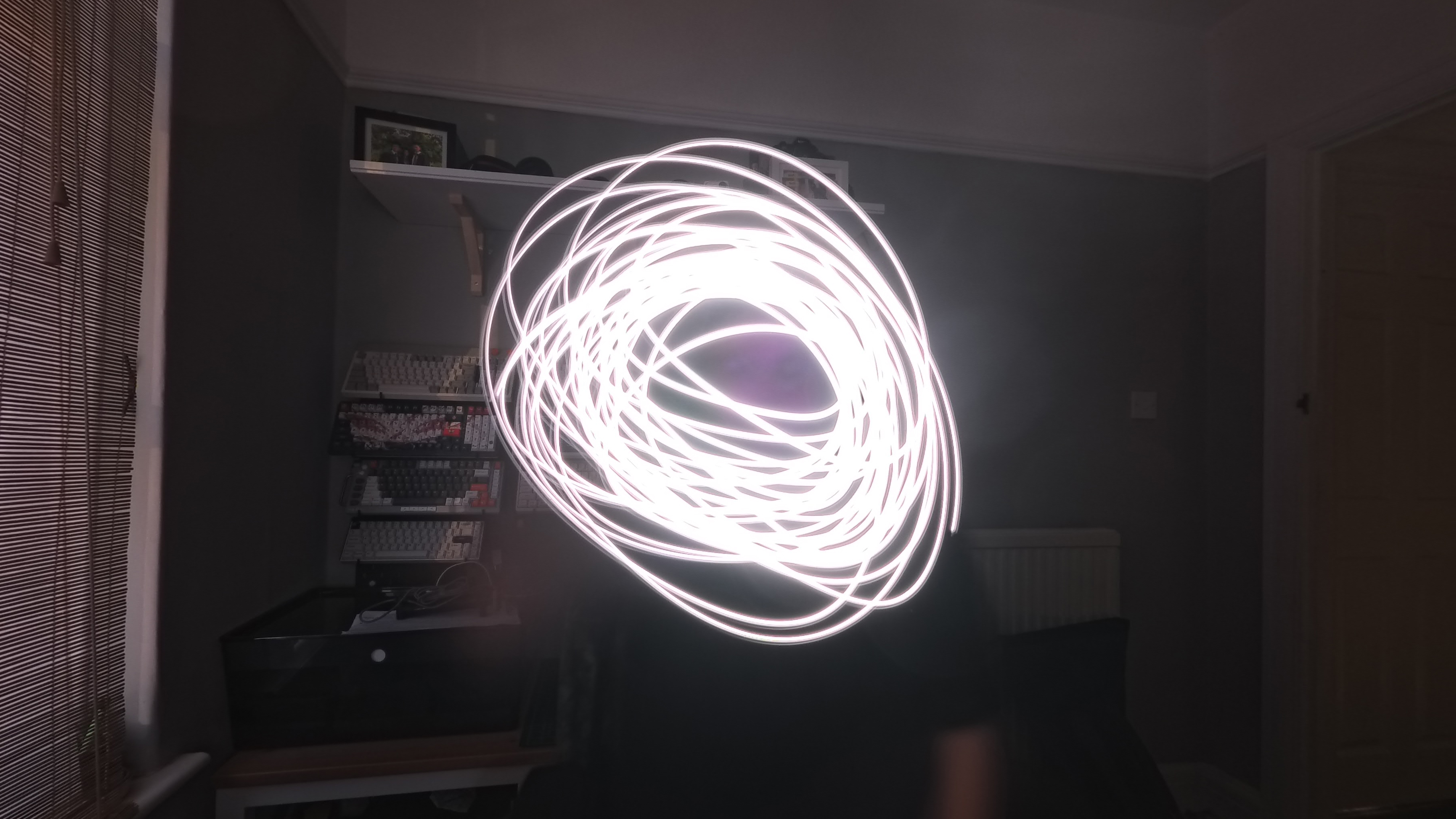 A photo of circular light trails painted using the INsta360 Ace Pro 2's Starlapse mode.