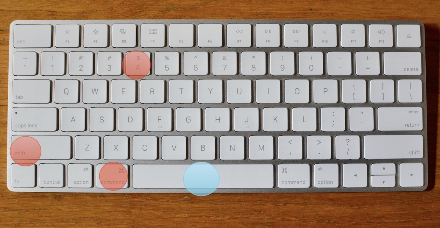 Command + shift + 4, then press space bar