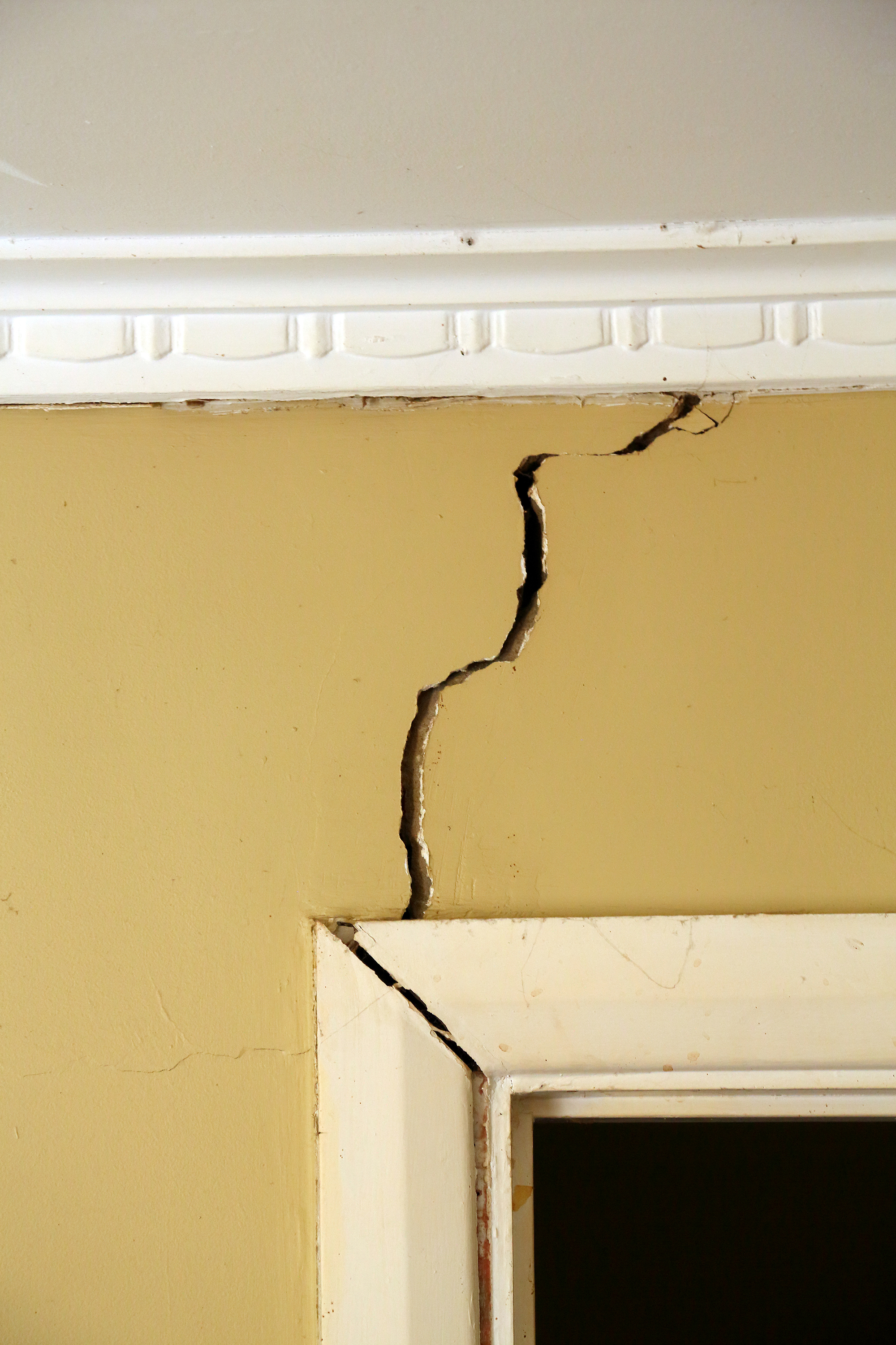 cracks in the walls of a house