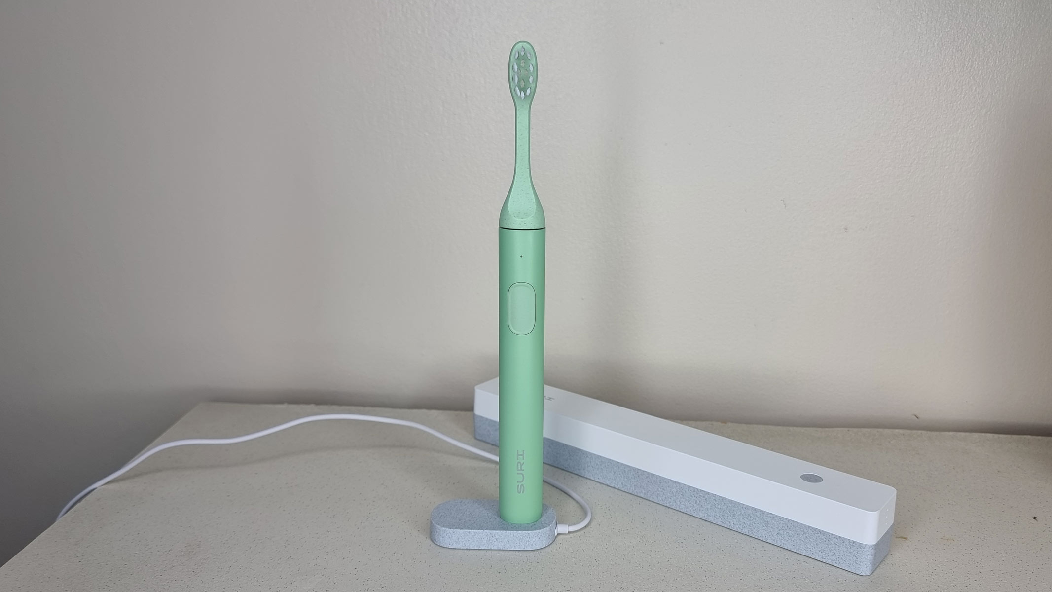 Suri electric toothbrush, a charger and a cleaning case