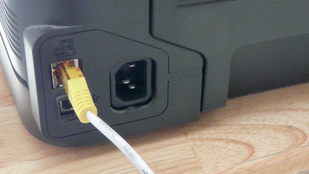 1. Connect wired printer to network