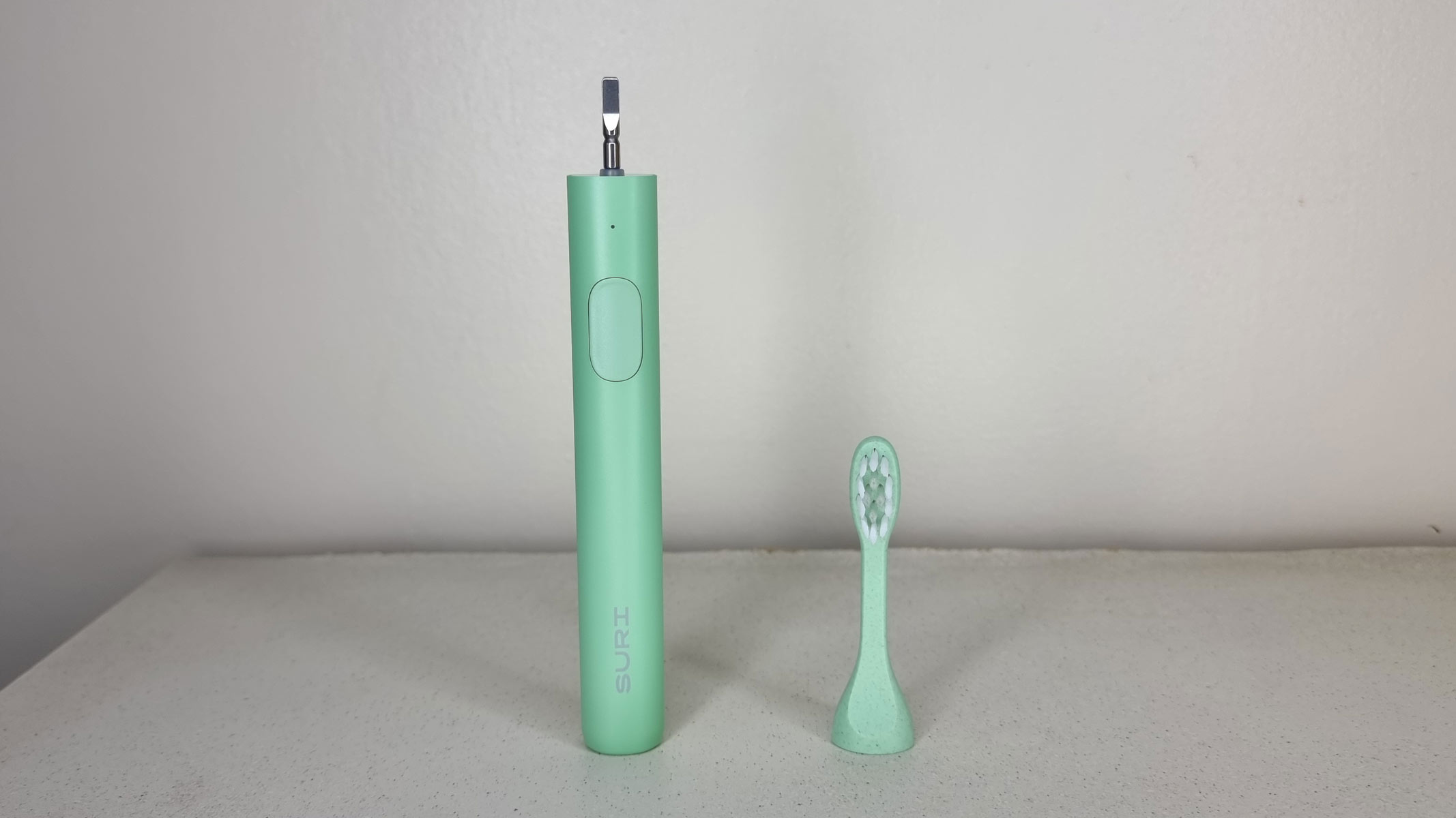 Suri electric toothbrush, disassembled