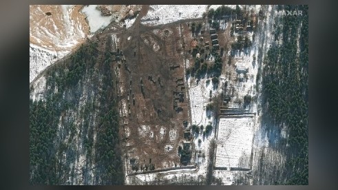 This image, snapped on Feb. 22, 2022, by a Maxar Worldview satellite, shows heavy equipment transporters in western Klintsy, Russia.