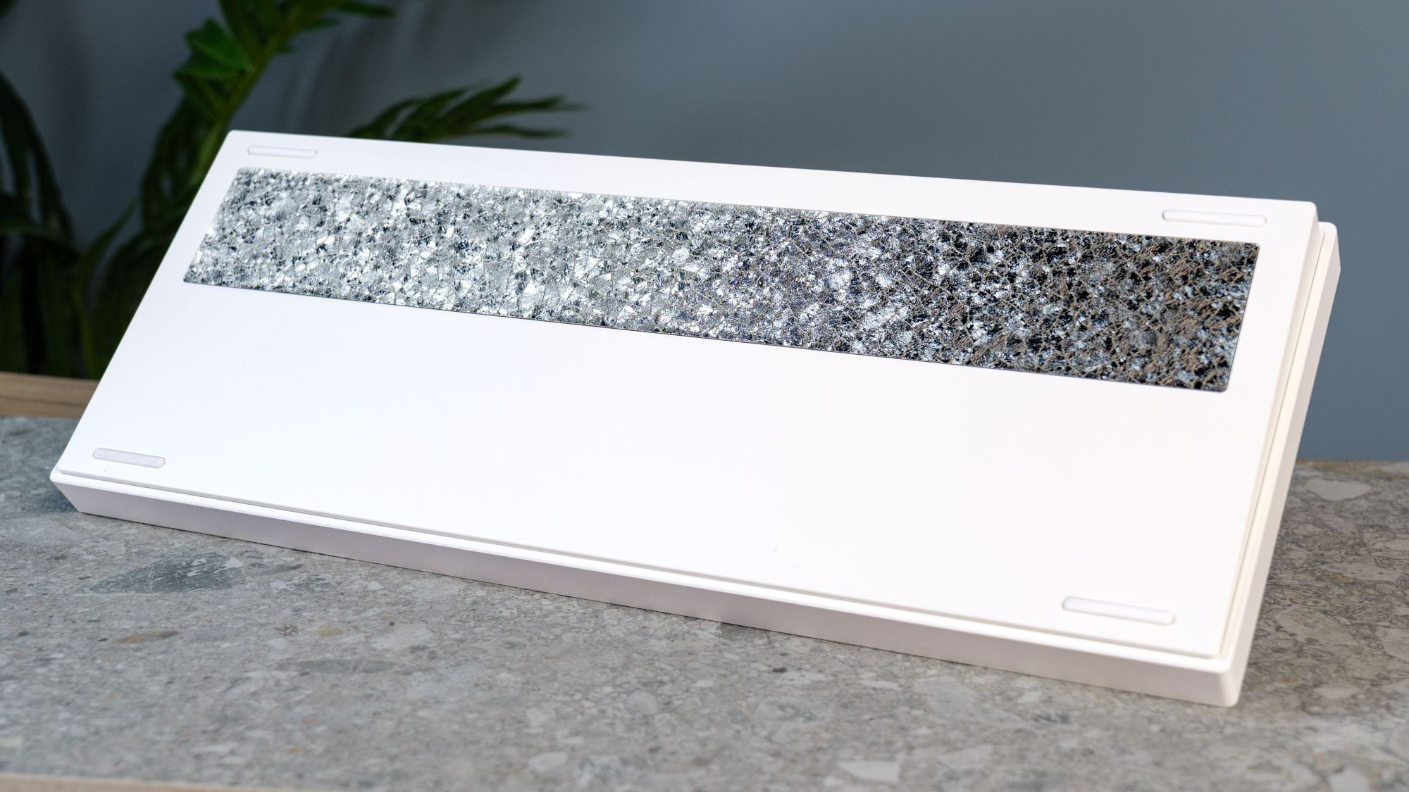The MCHOSE GX87 keyboard on a slate surface