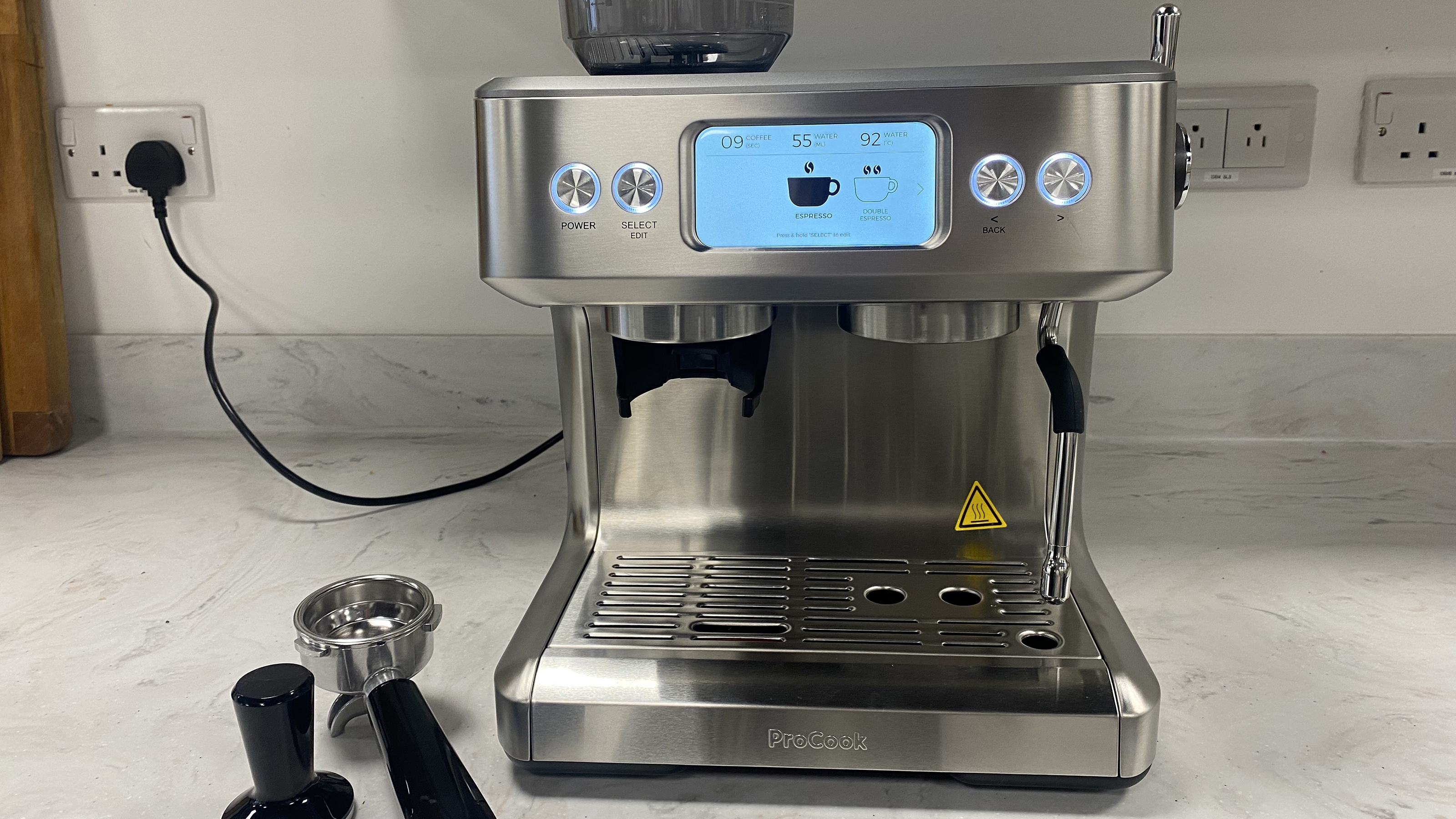 Testing ProCook's new stainless steel bean to cup coffee machine on a marble countertop