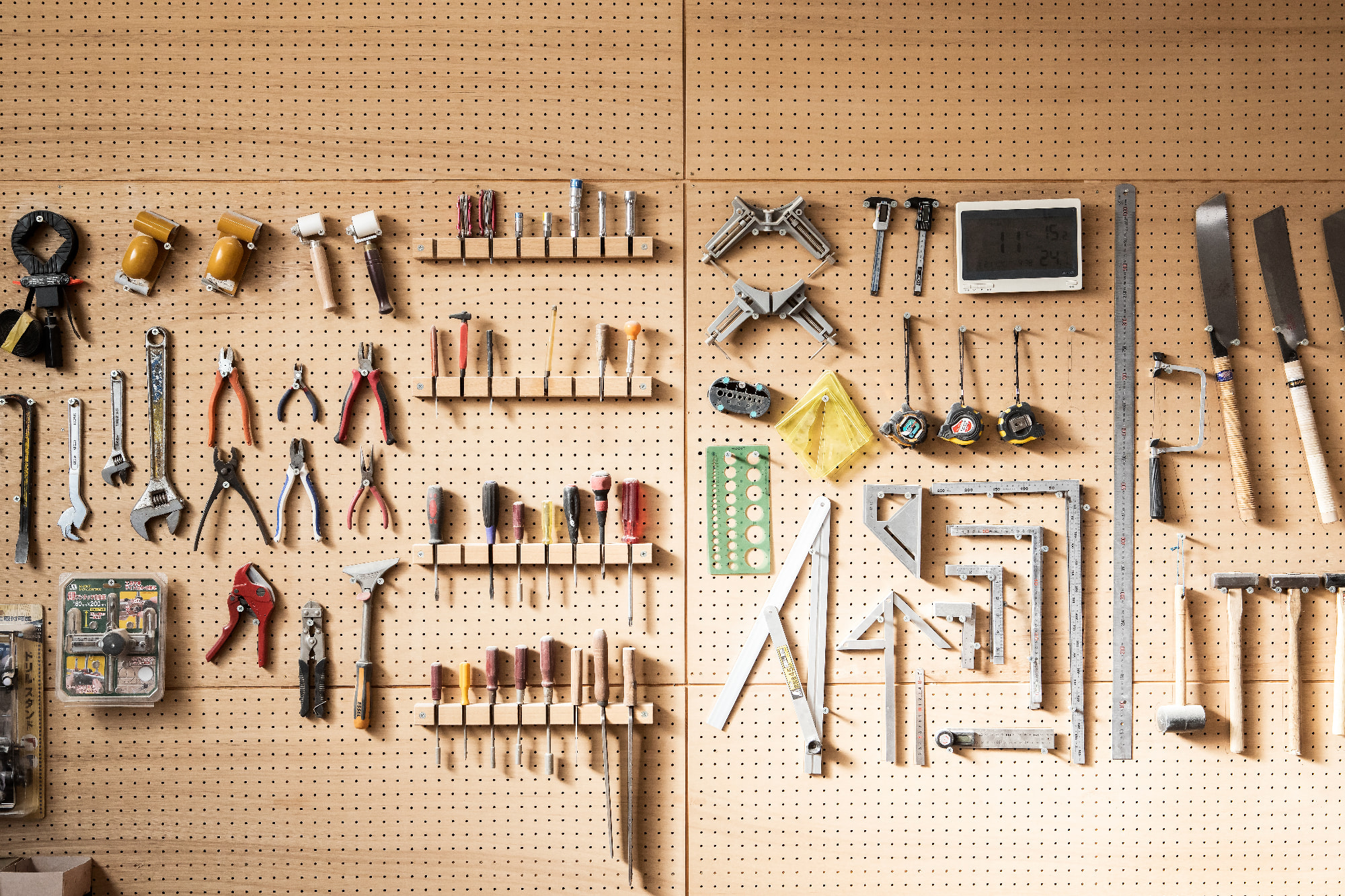 Various DIY tools arranged on the wall 