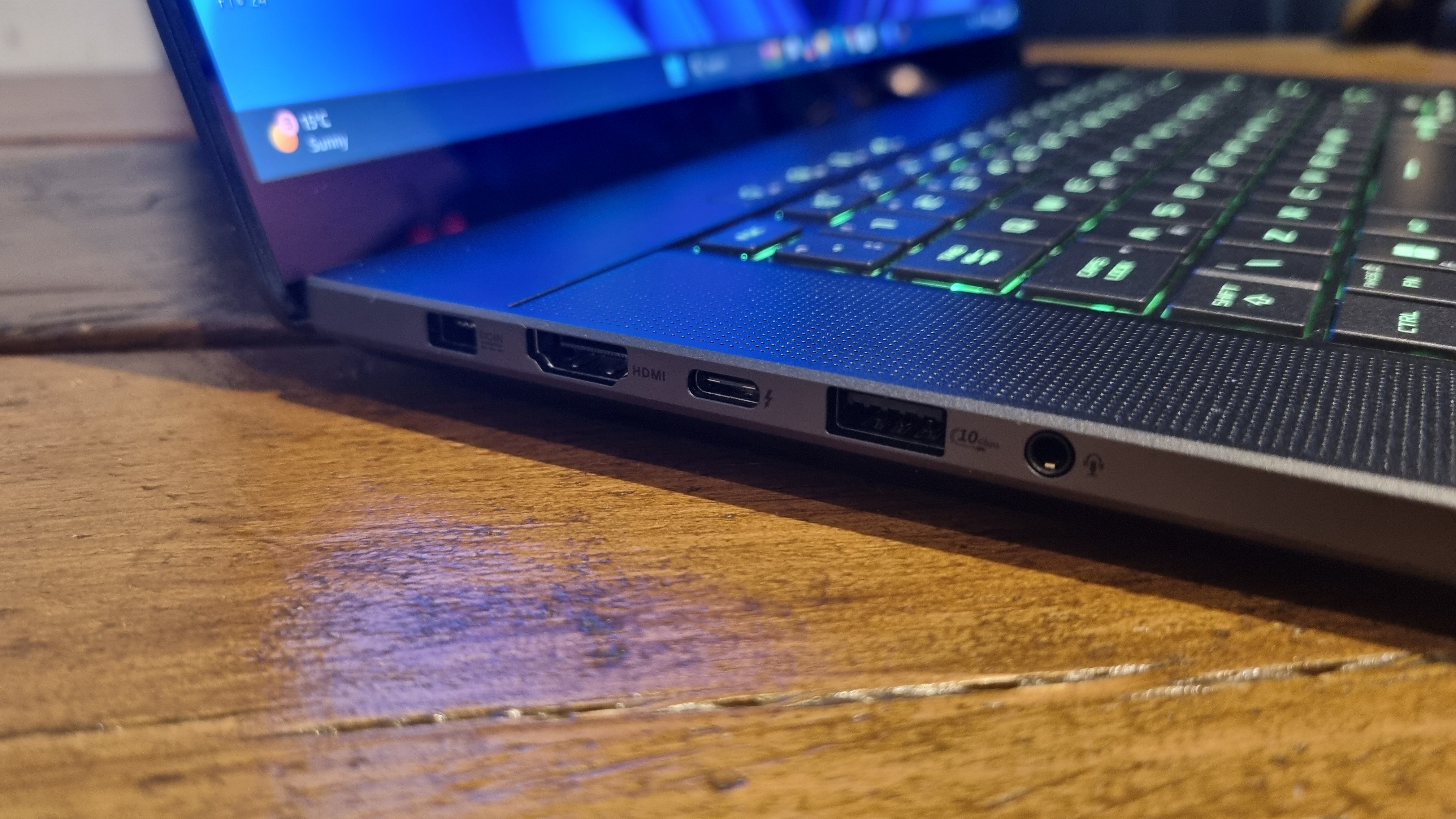 The left side of the Asus ROG Zephyrus G16 gaming laptop, showing an HDMI port, USB ports, a charging port, and a 3.5 mm jack