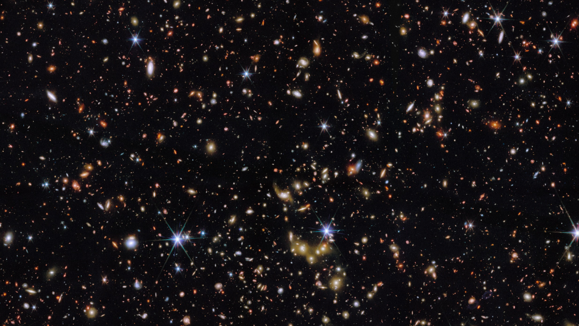 Thousands of galaxies in various shapes and sizes are captured in this new image from the James Webb Space Telescope. More distant galaxies appear redder and smaller, compared to galaxies that are closer and appear larger and white or blueish.