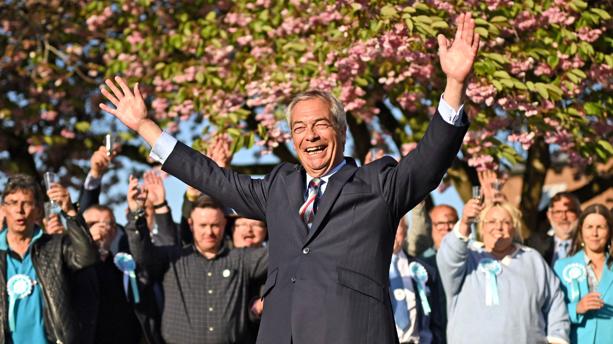 Nigel Farage celebrates with Reform UK supporters at Staffordshire County Showground after the party took won control of Staffordshire County Council 