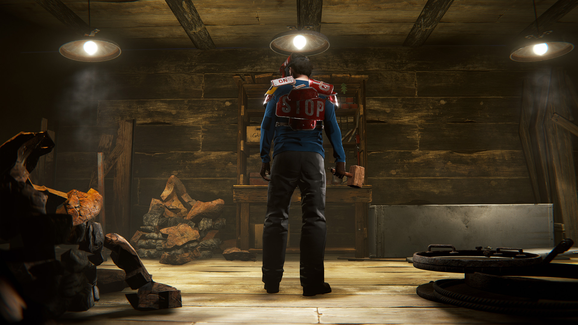 A man wearing armour made of road signs stands in a shack surrounded by ruined storage items in Rust.