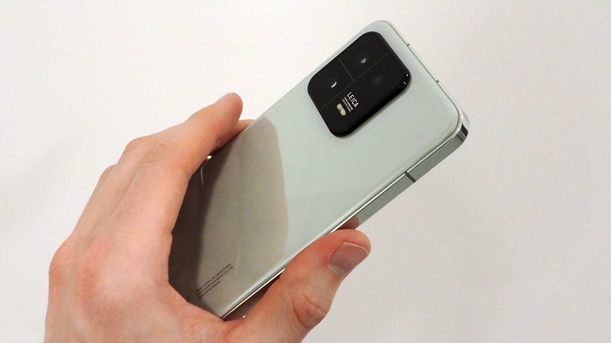 Xiaomi 13 review back angled handheld