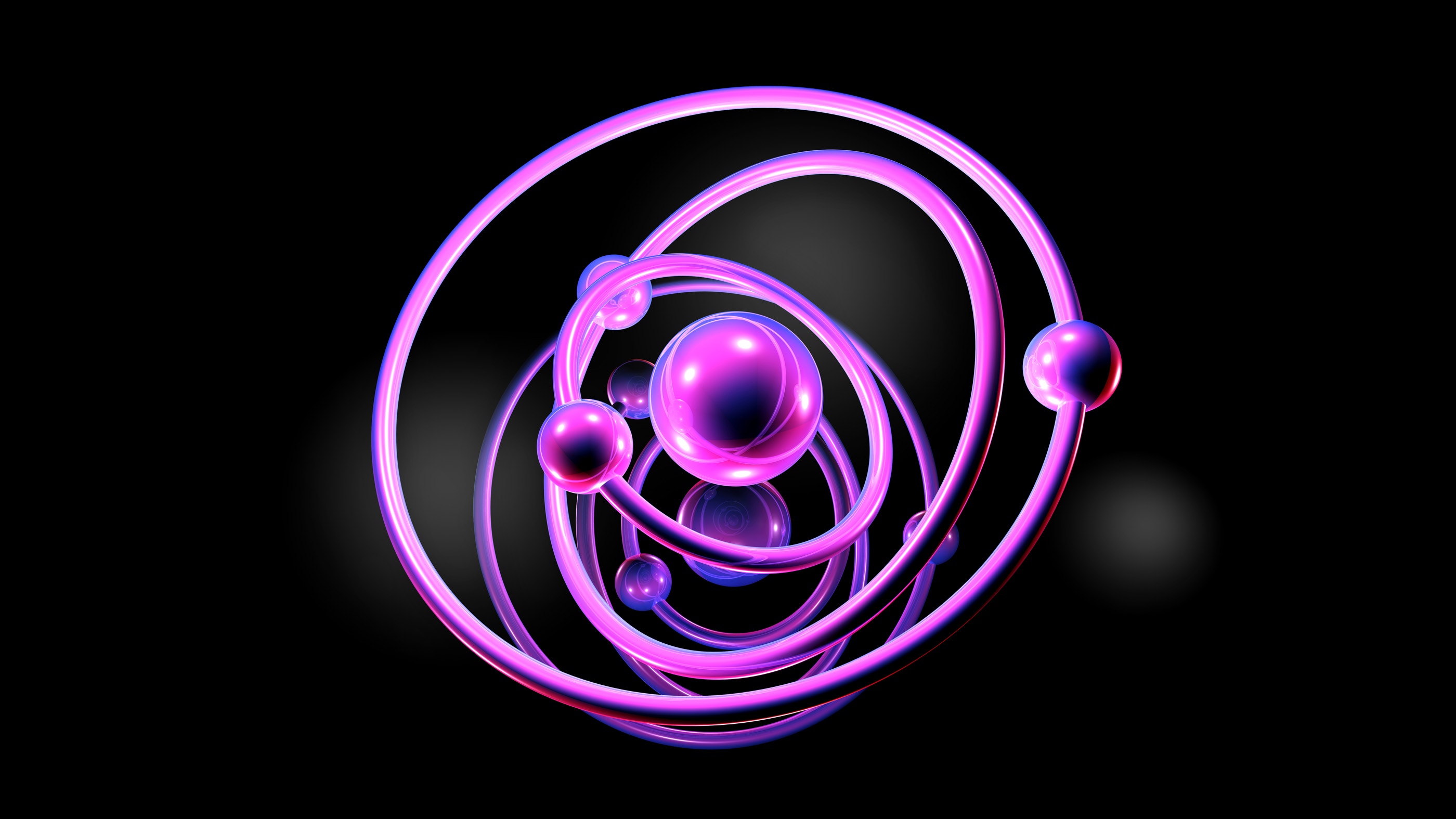 An abstract model of an atom with electrons swirling around in their shells.
