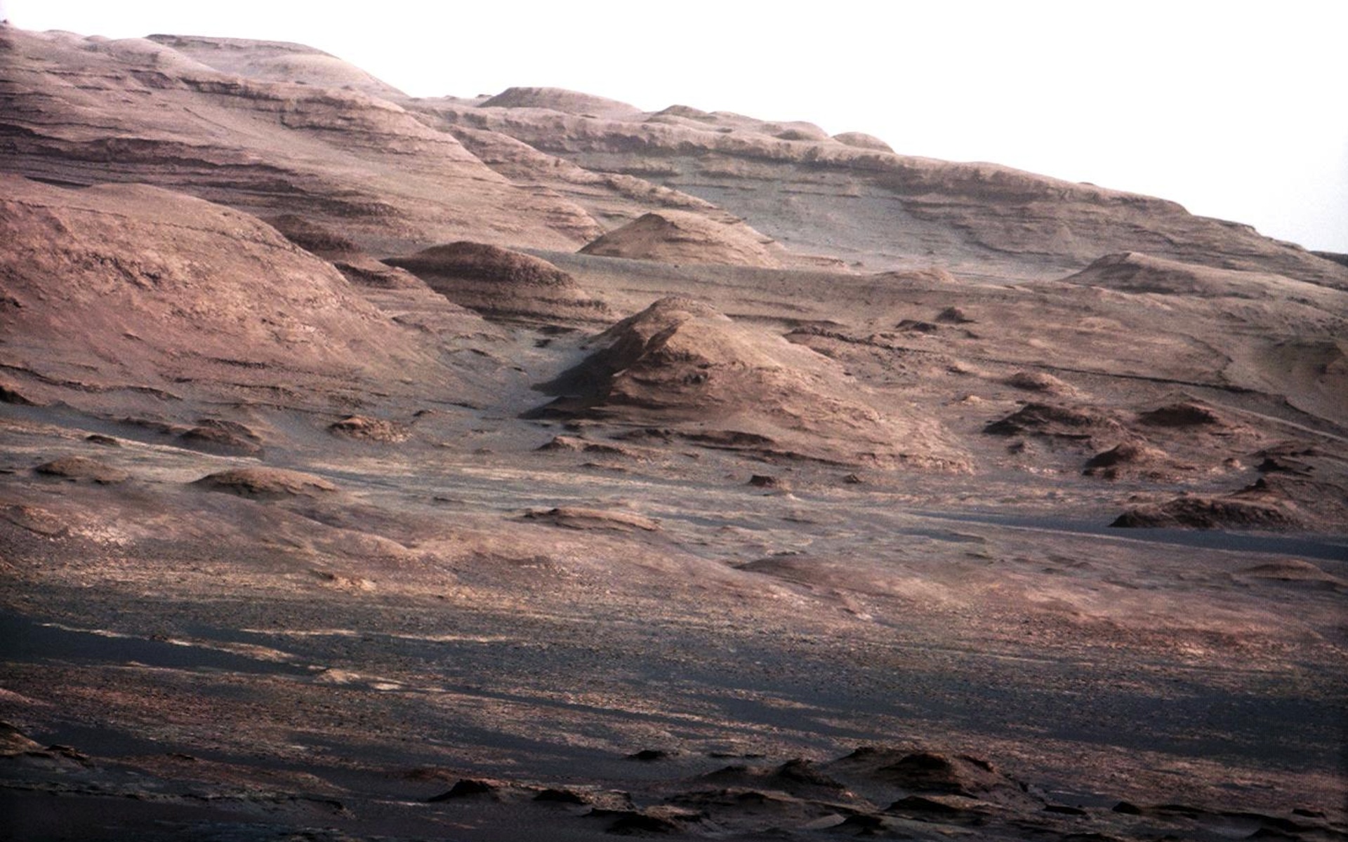 A rocky reddish scene of Mars.
