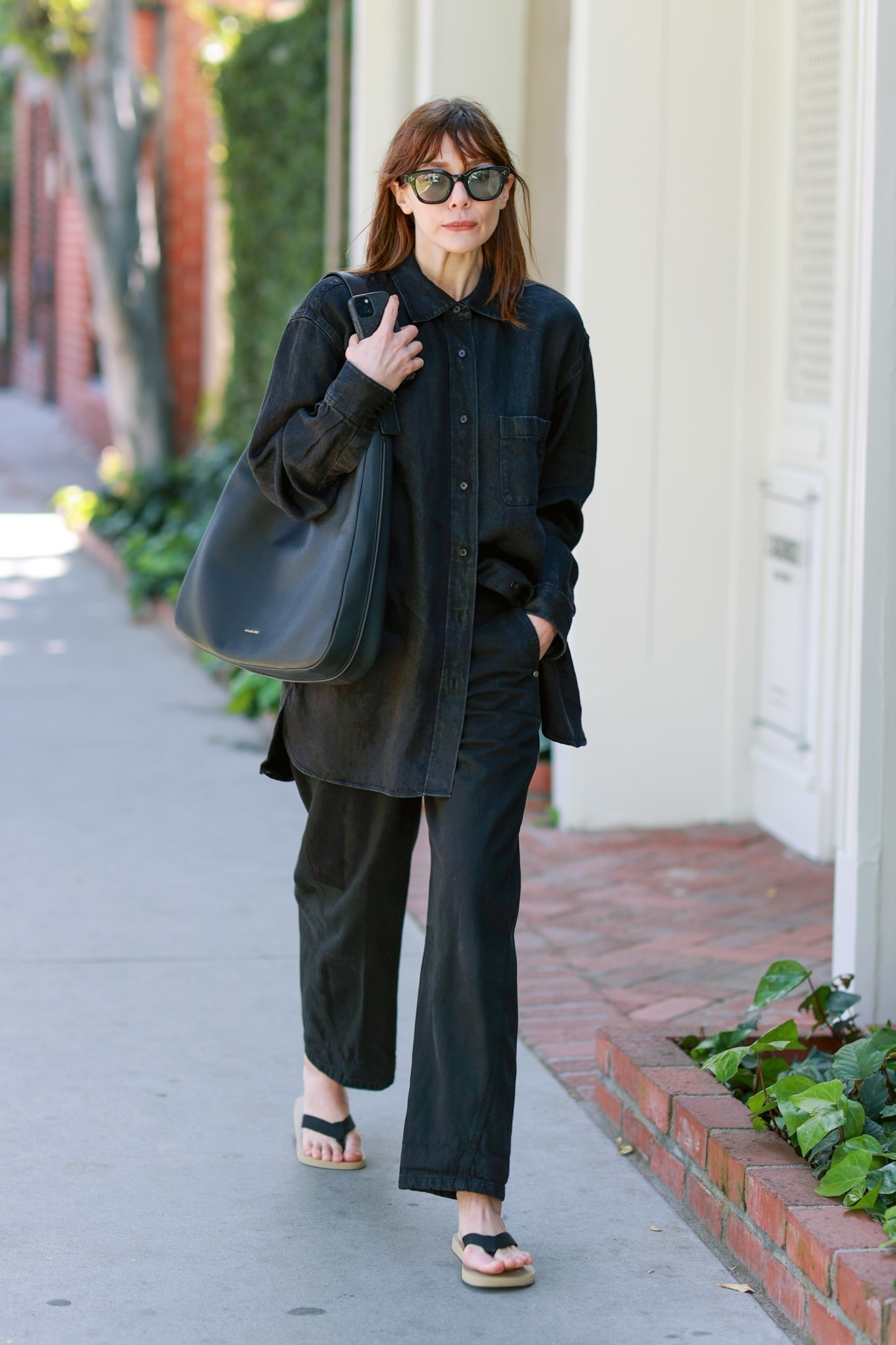 Elizabeth Olsen was seen walking on Melrose Place on Saturday morning. She seemingly visited her sister's store on April 20.