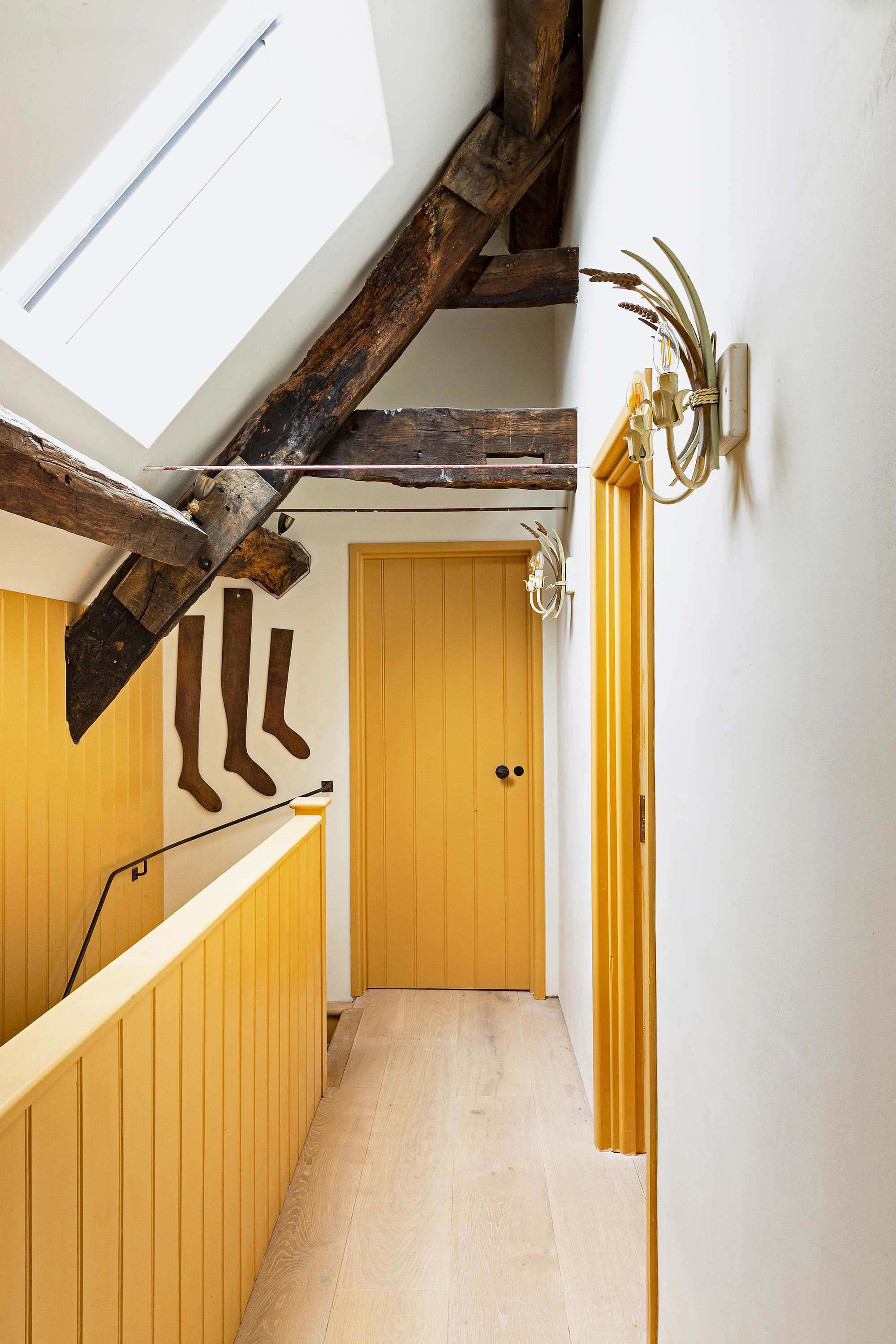 Yellow doors and woodwork in Trumpington Yellow by Edward Bulmer at Number One Bruton