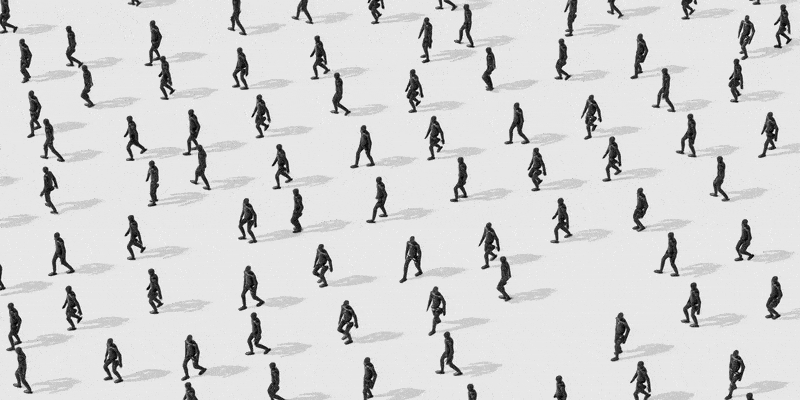 An animation showing dozens of robots walking naturally across a white background