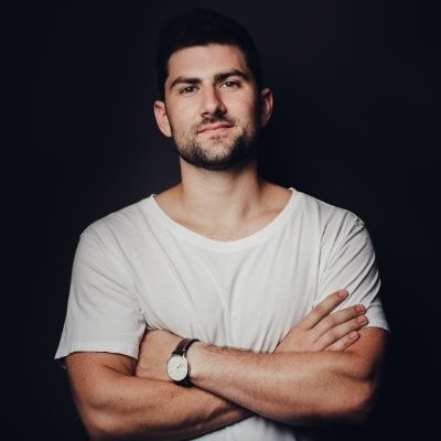 Headshot of Jack Thweatt in a white t-shirt
