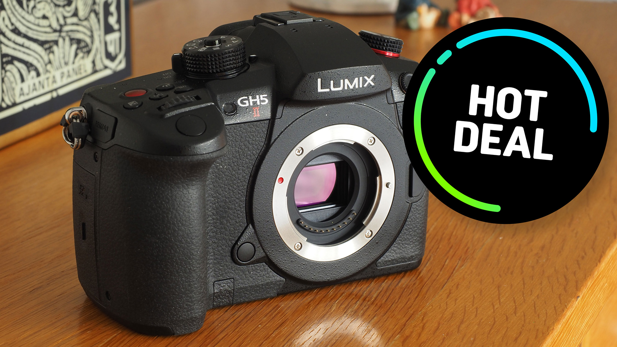 Panasonic Lumix GH5 II on a wooden tabletop 