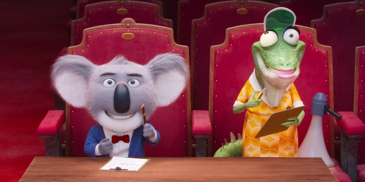 Buster Moon and Miss Crawly sitting in the audience in Sing
