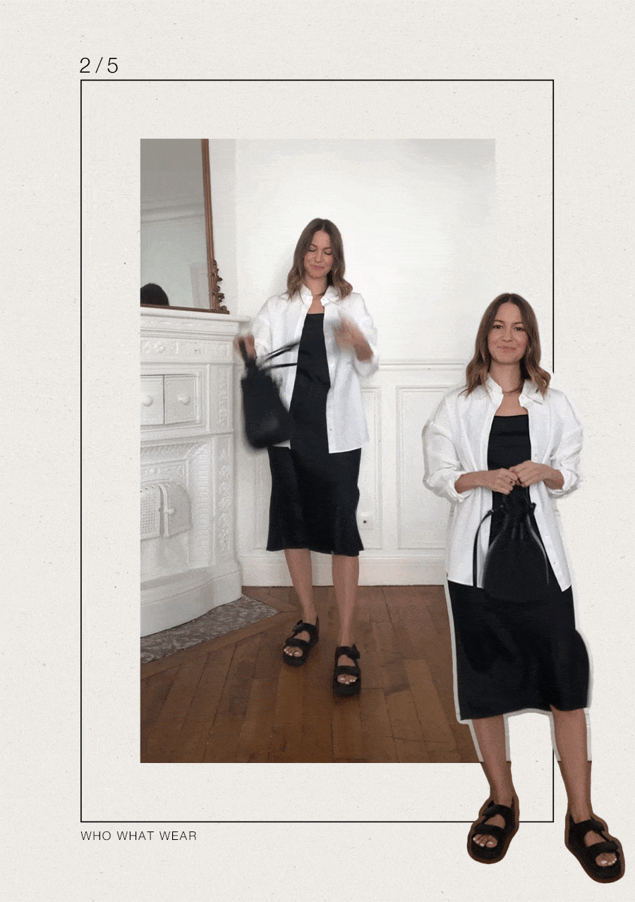 Marissa Cox wears a black slip dress, a white button-down shirt, black sandals, and a black bag.