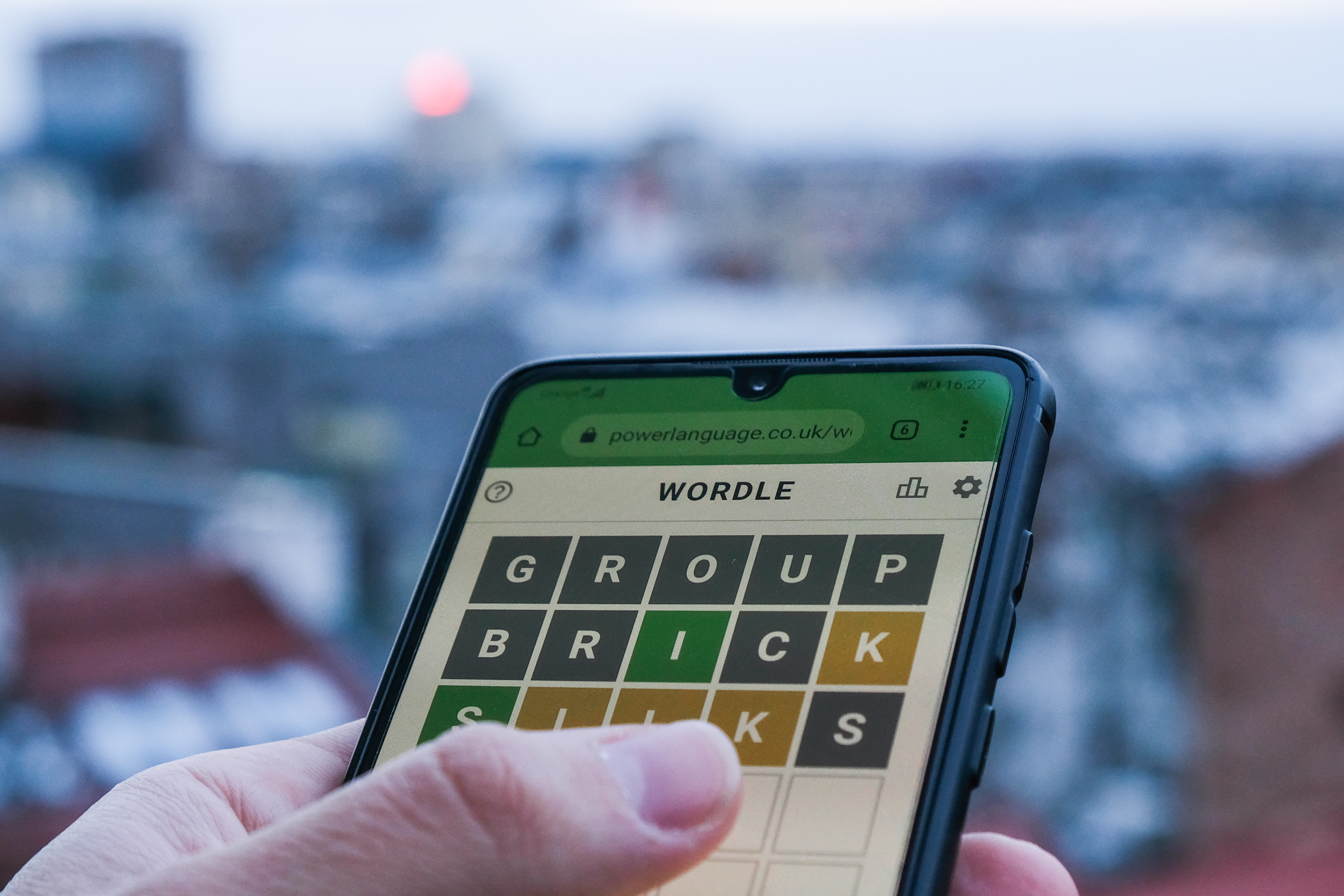 Wordle being played on a phone.