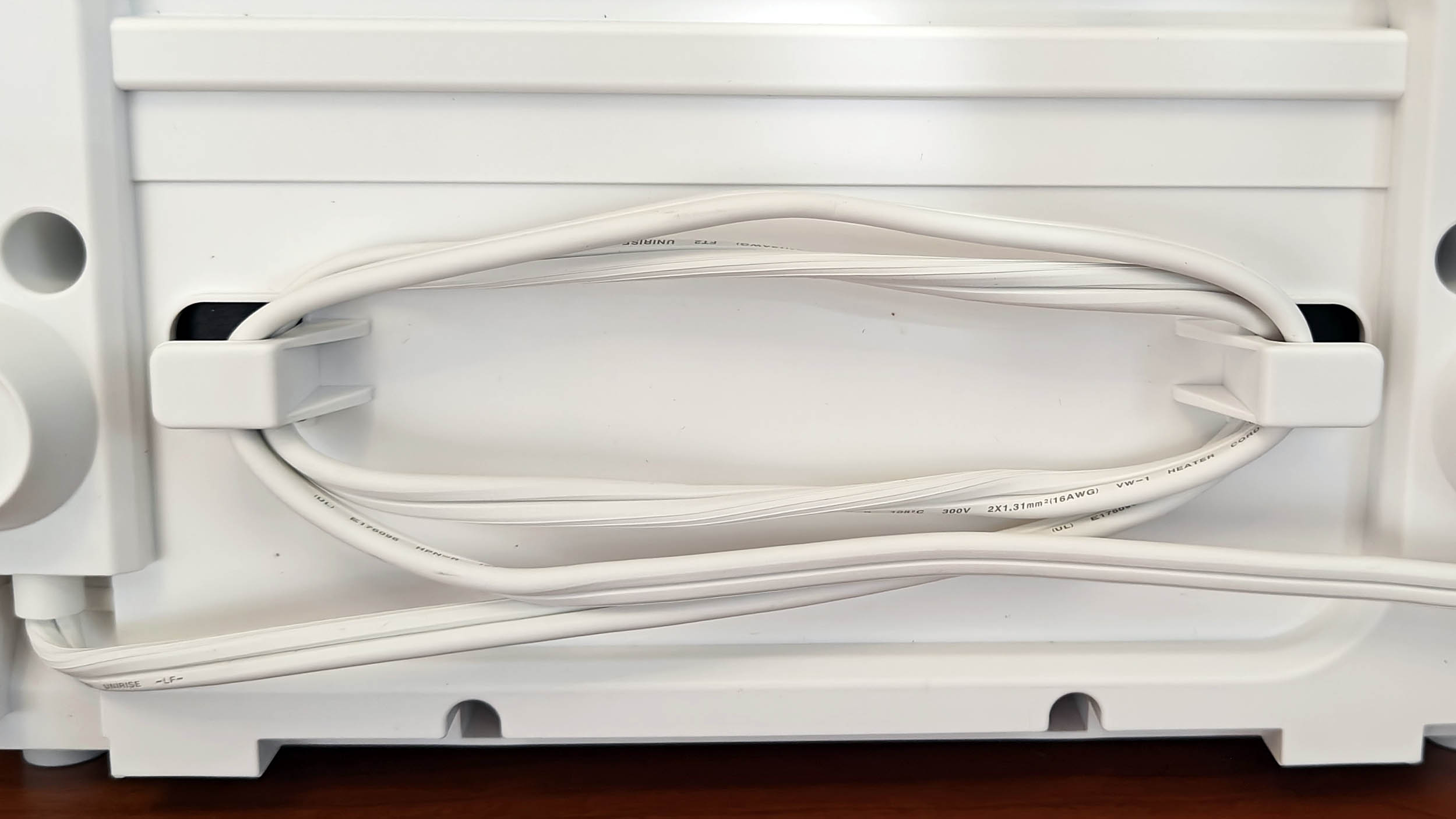Rear side of the Dreo Smart Wall Space Heater showing the cabling