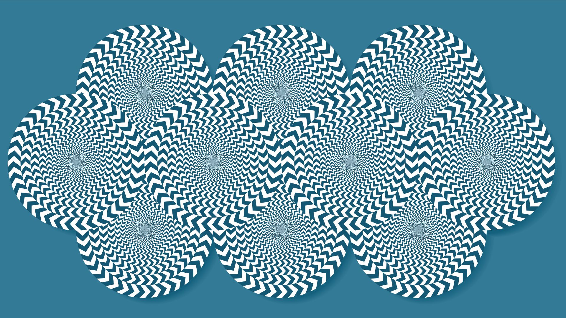 an illustration of the classic rotating snakes illusion, made up of many concentric circles with alternating stripes layered on top of each other