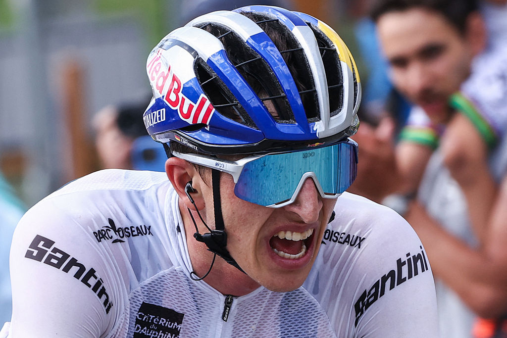 Red Bull - BORA - hansgrohe&#039;s German rider Florian Lipowitz cycles to the finish line of the 7th stage of the 77th edition of the Criterium du Dauphine cycling race, 131,6 km between Grand-Aigueblanche and Valmeinier, on June 14, 2025. (Photo by Anne-Christine POUJOULAT / AFP) (Photo by ANNE-CHRISTINE POUJOULAT/AFP via Getty Images)